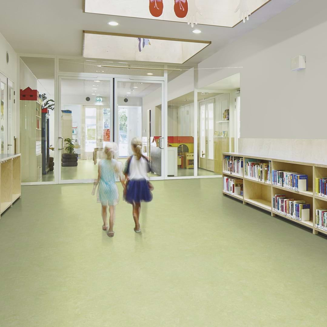 Eco-friendly linoleum flooring for commercial spaces Natural Marmoleum floors in modern kitchen