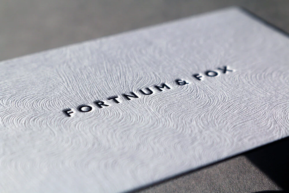Letterpress business cards on embossed Colorplan.