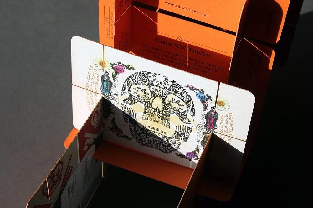 Custom printed and die cut promotional cards for United Creatives.