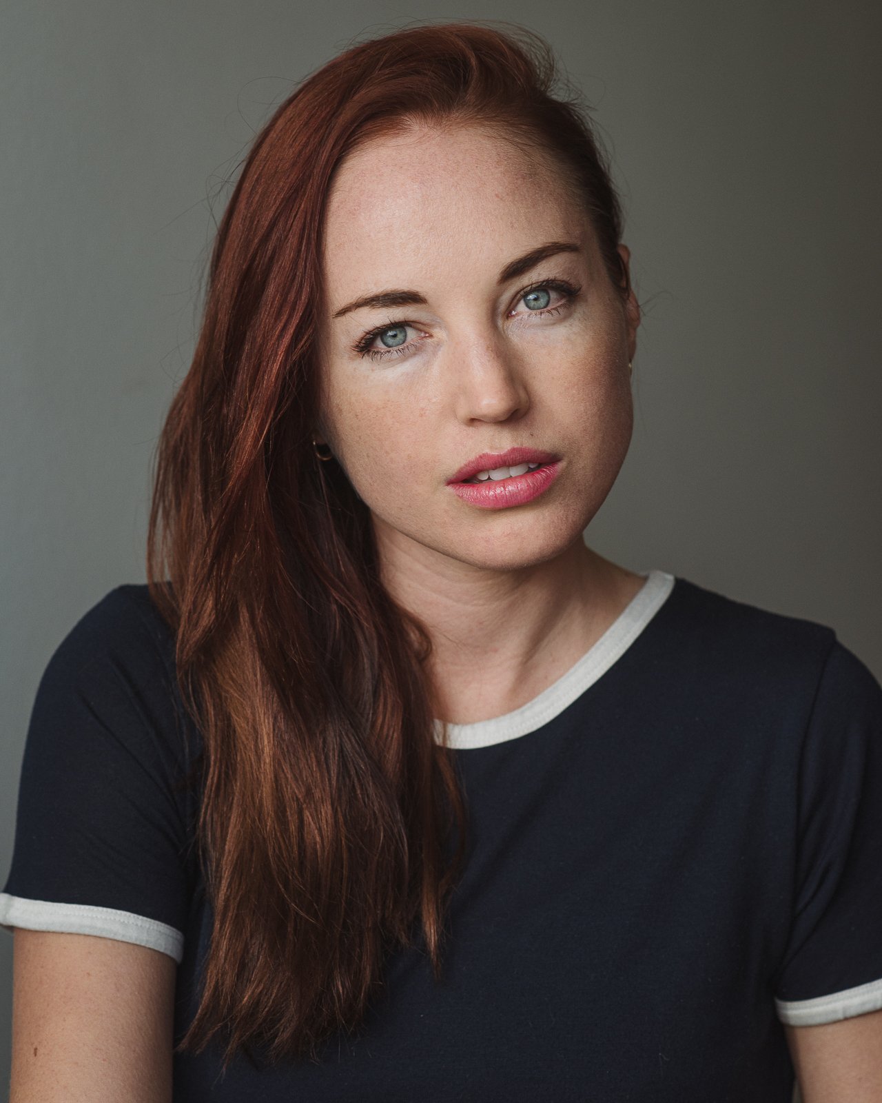 Cape Town actor headshot of a red-haired actress for theatre, film, and casting portfolios.
