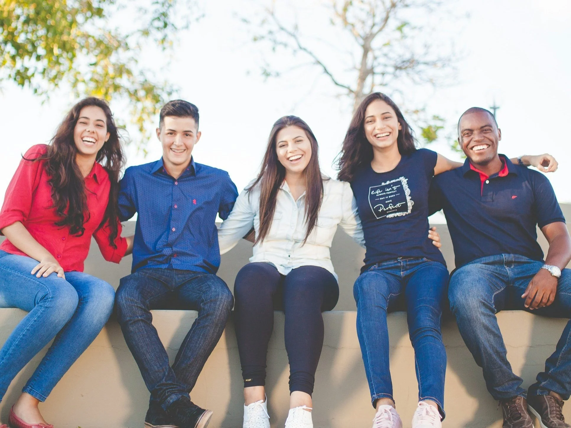Image of 5 Teens sitting on a bench. Image links to Licking County Job and Family Services Former Foster Youth Page.