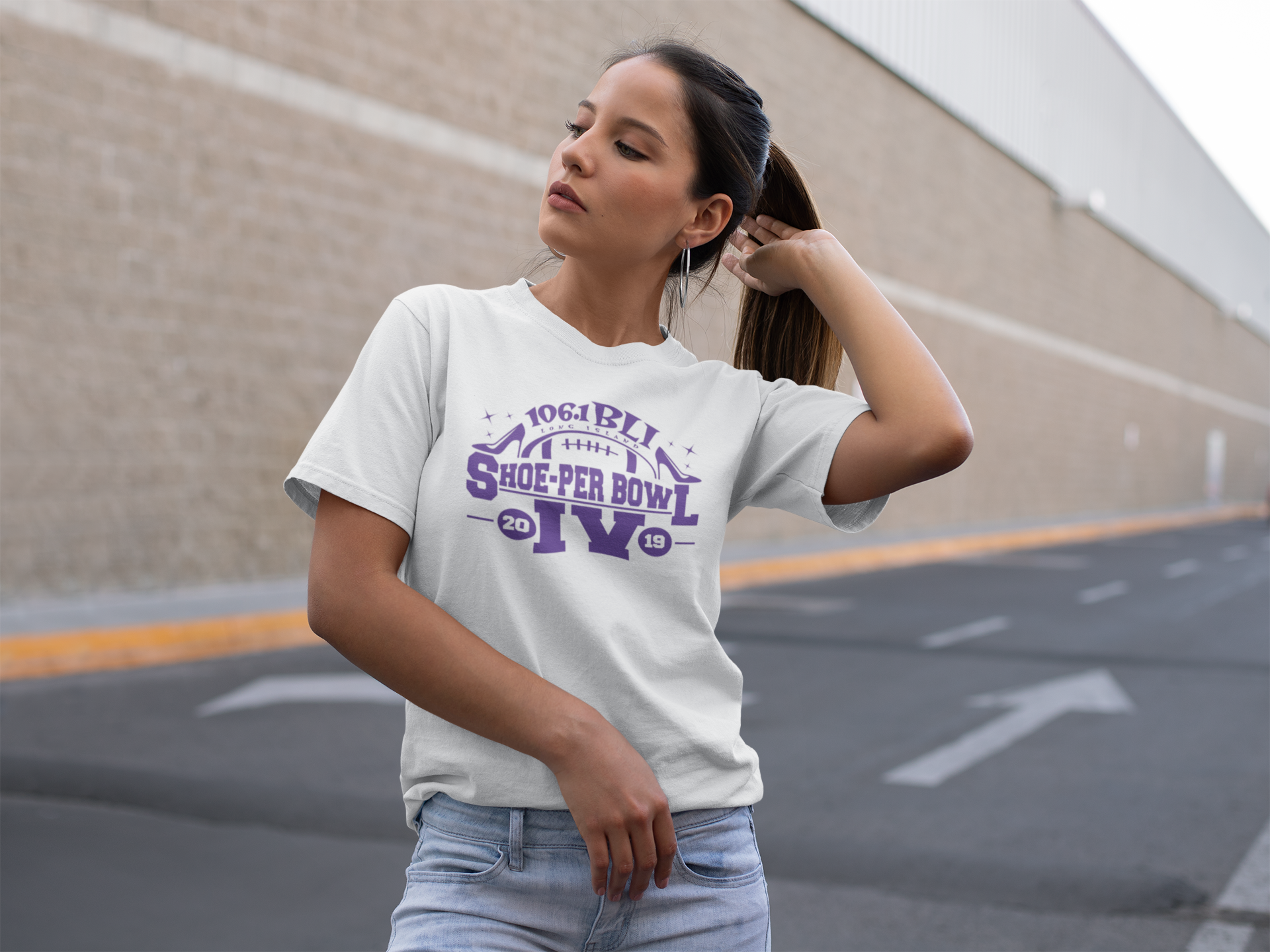 mockup-of-a-girl-wearing-a-unisex-t-shirt-outside-a-mall-23037.png