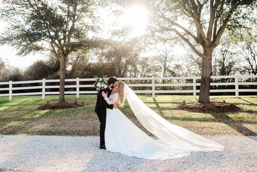 Bride and groom enjoying a quiet moment together outside on their wedding day
