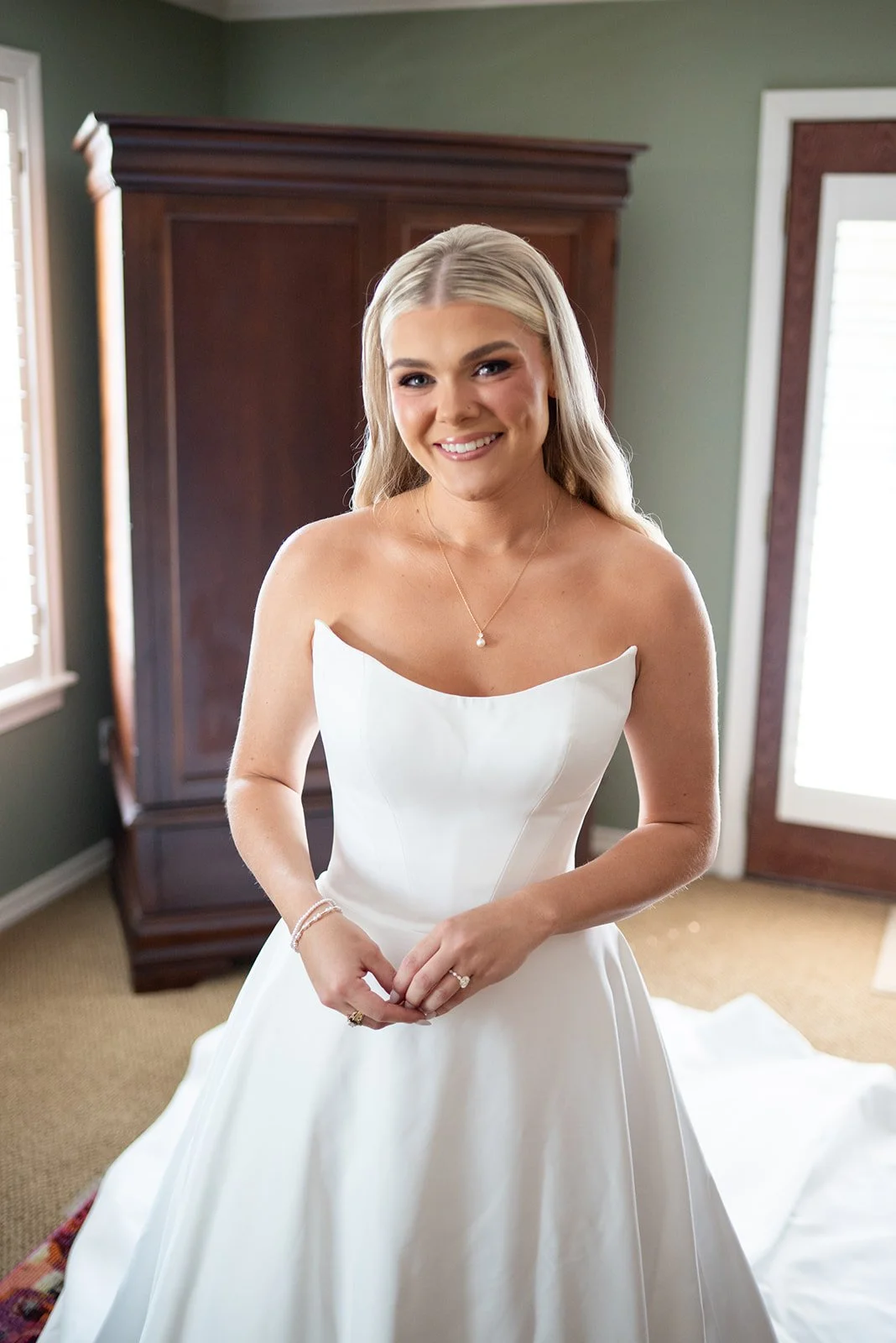 Bride Makenzie posing for a beautiful bridal portrait on her wedding day.