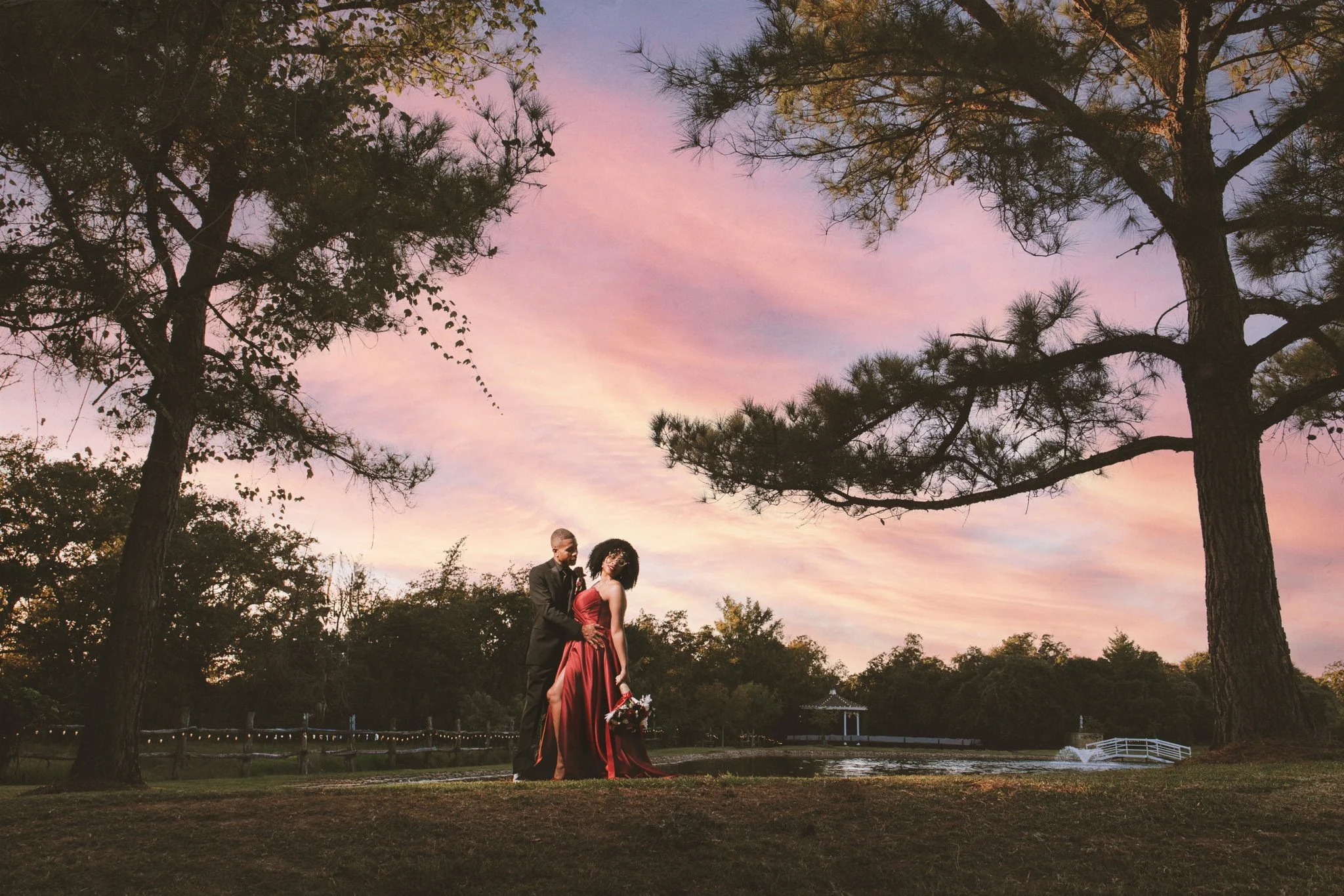 Newly married couple pose at the Inn at Quarry Ridge wedding venue