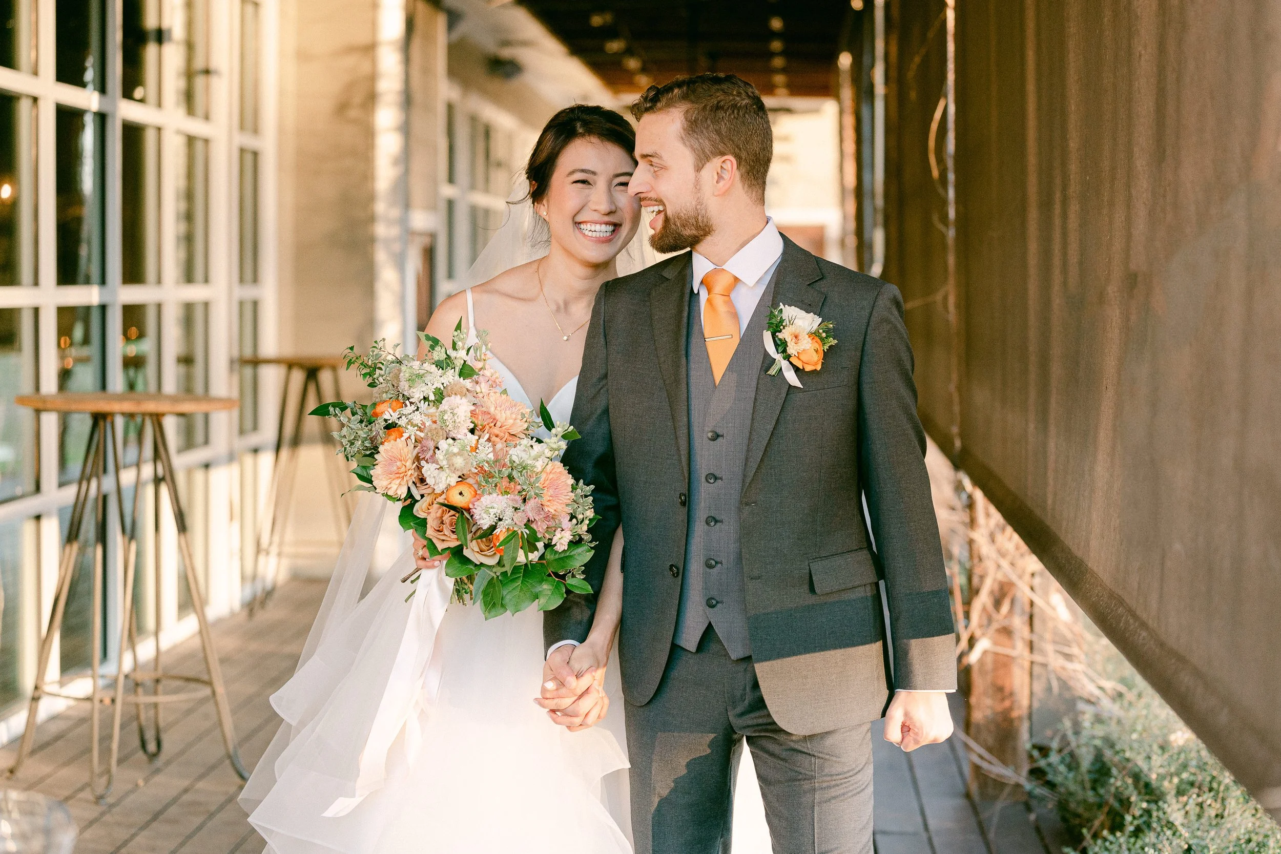 Bride and groom share a private moment after their outdoor ceremony