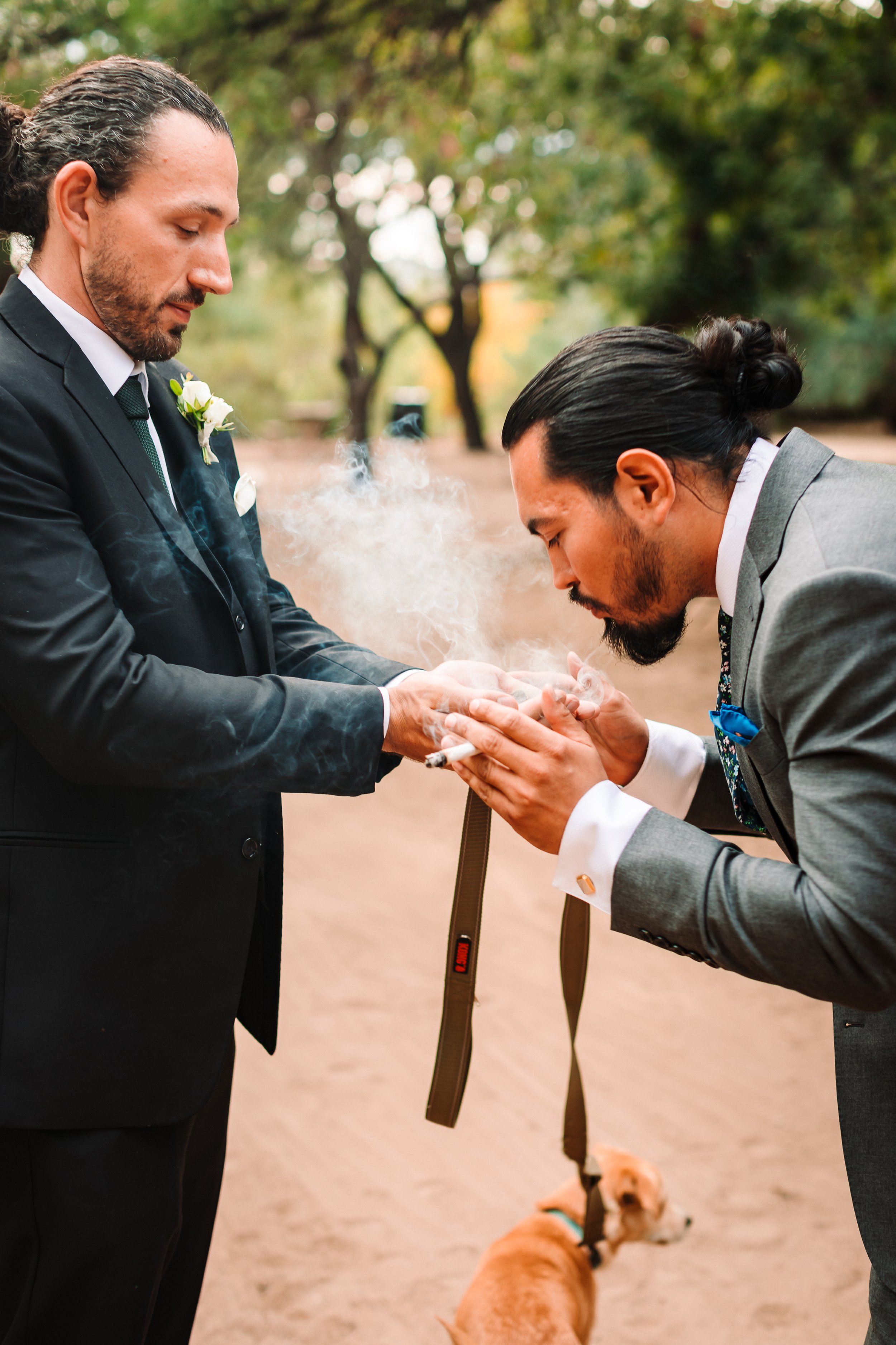 groom smudges and blesses bestman.jpg