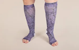 Mischief printed LympheDIVAs knee-high compression socks