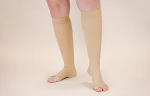 Beige printed LympheDIVAs knee-high compression socks