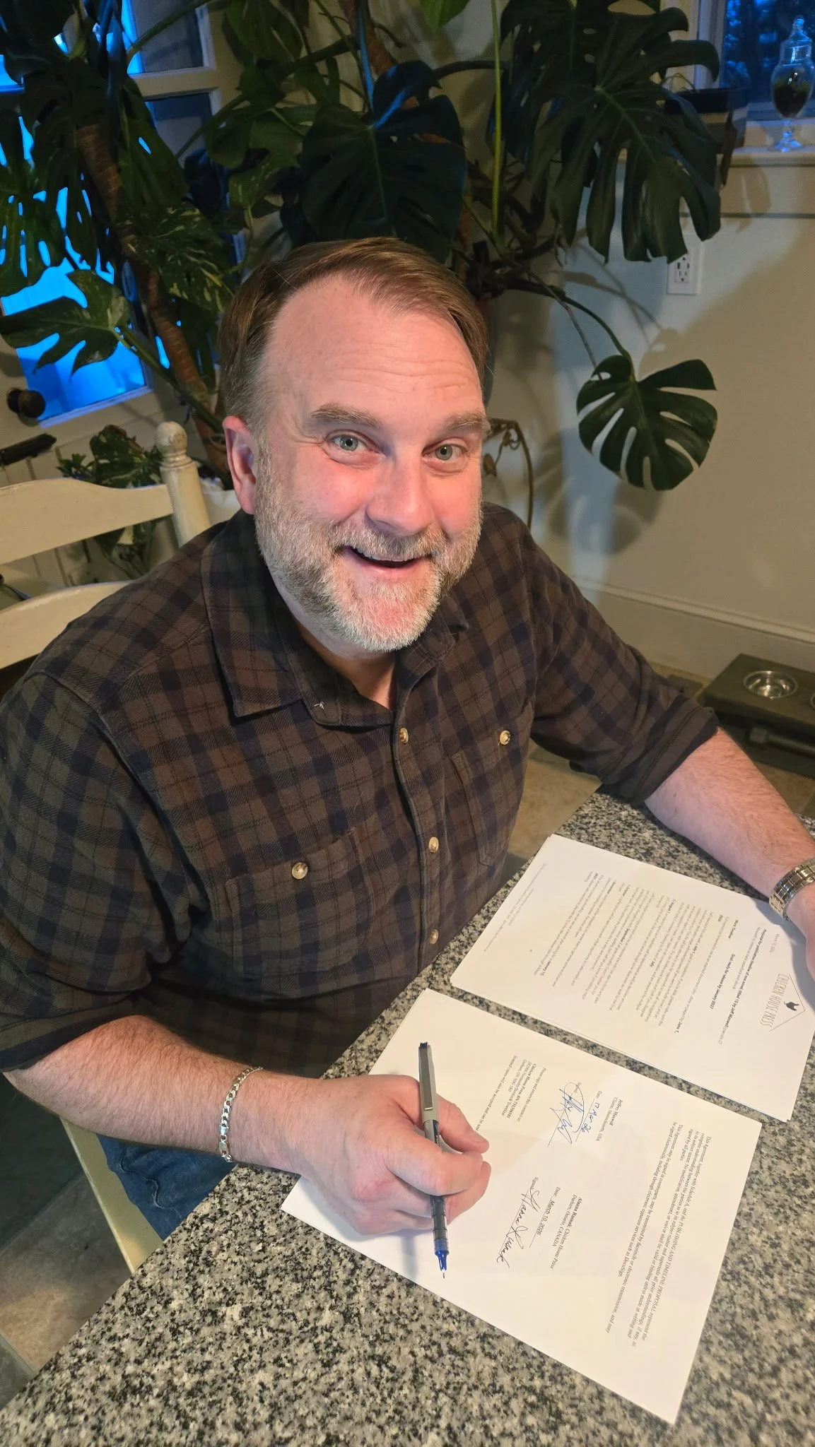 JT signing contract for 15.jpg