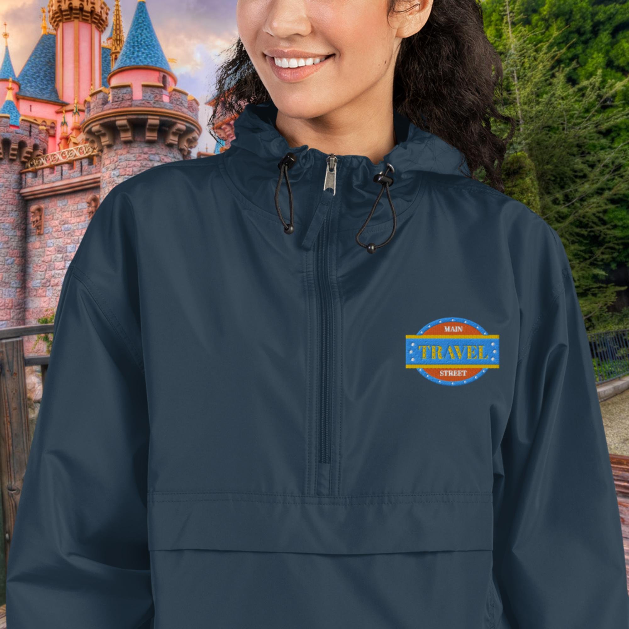 embroidered-champion-packable-jacket-navy-zoomed-in-64d6fd8fb9d55.jpg
