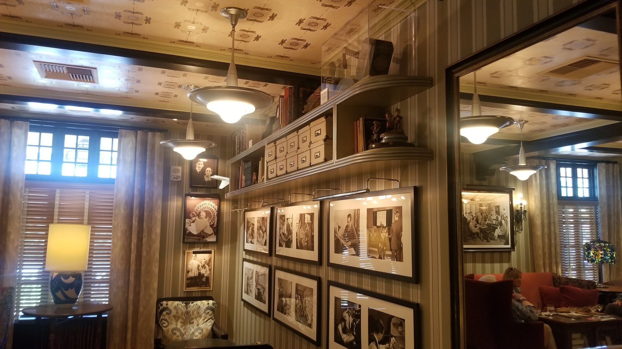 Wall of photos inside a lounge