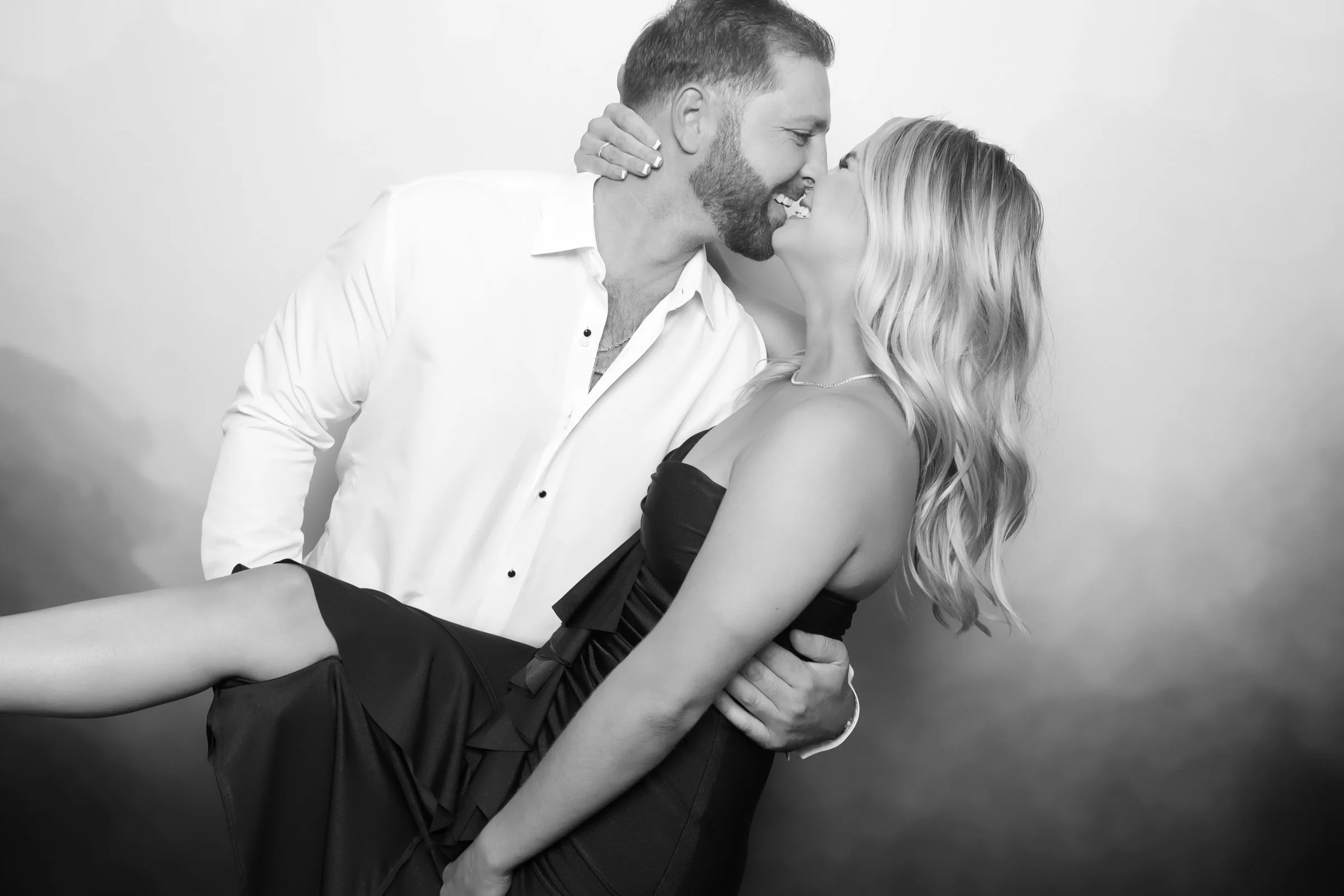 Couple poses for Glam photo booth wedding OKC
