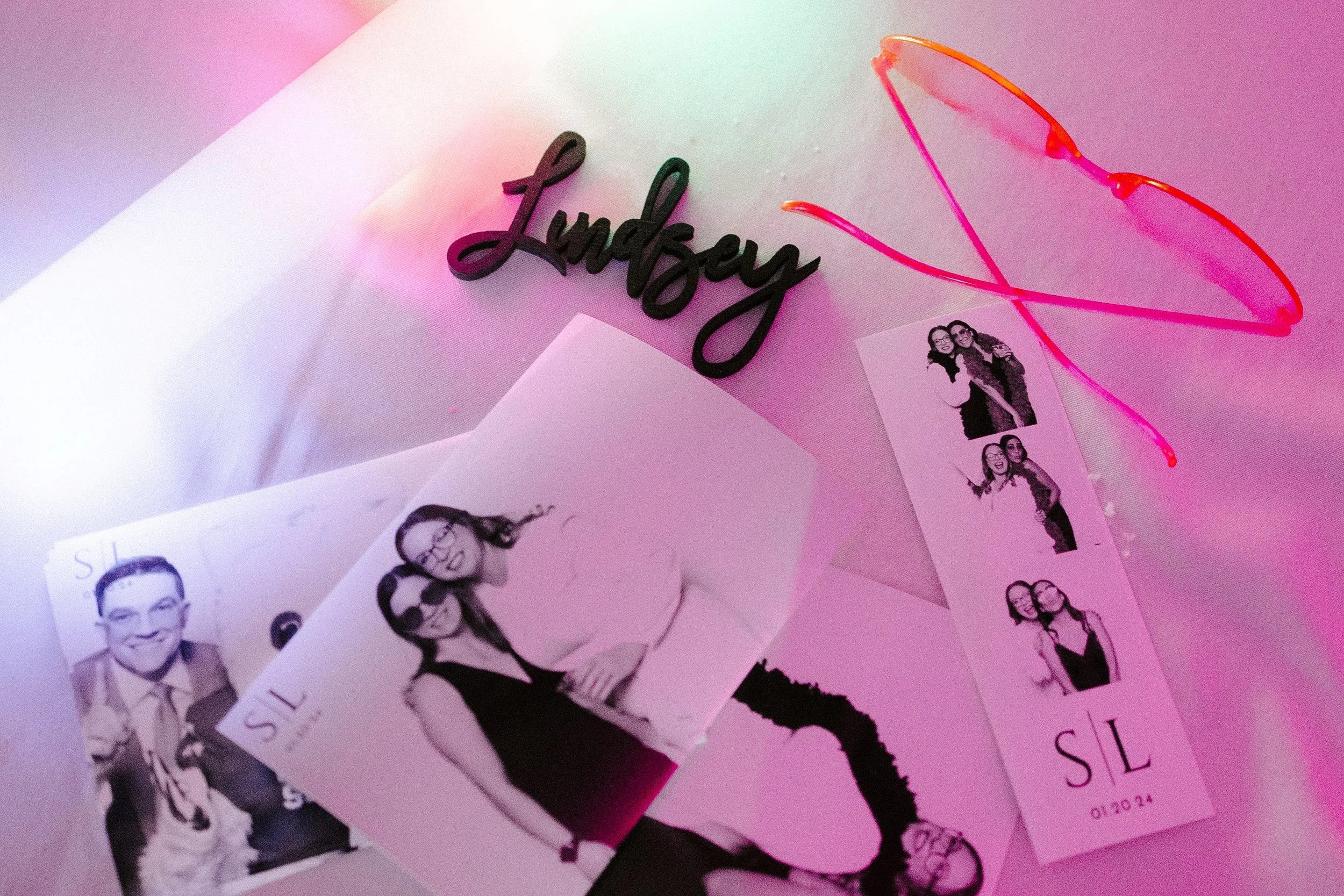 Glam photo booth prints at wedding in OKC