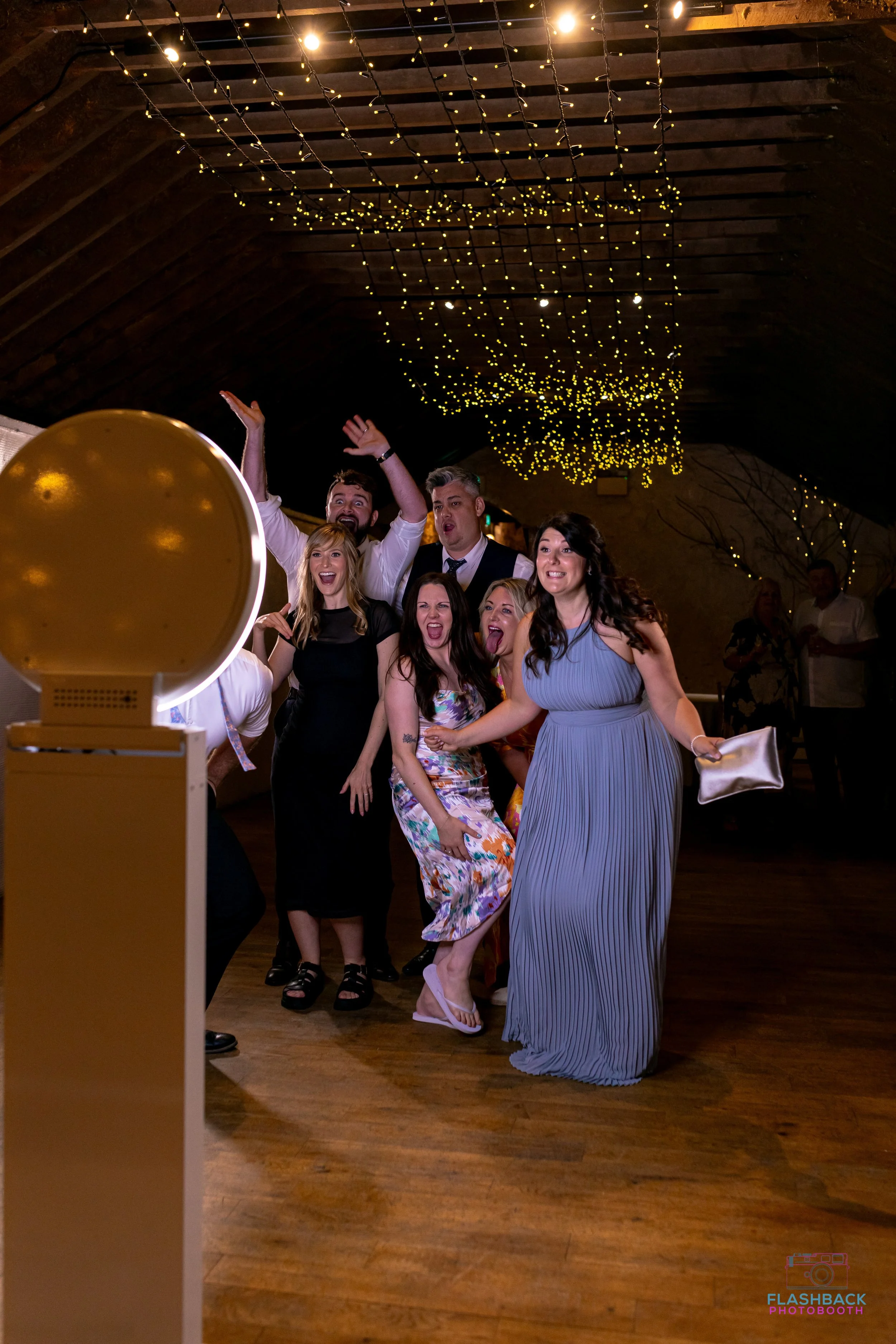 Wedding guests pose Social Booth OKC