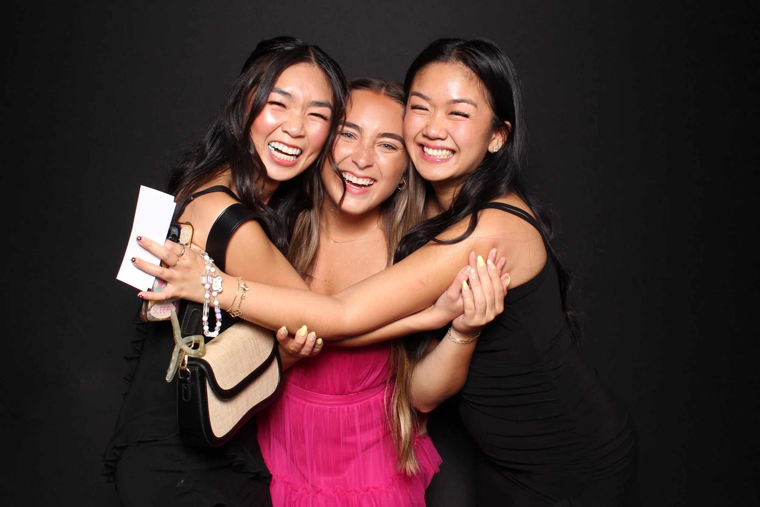 Friends posing in Traditional Print Booth in OKC
