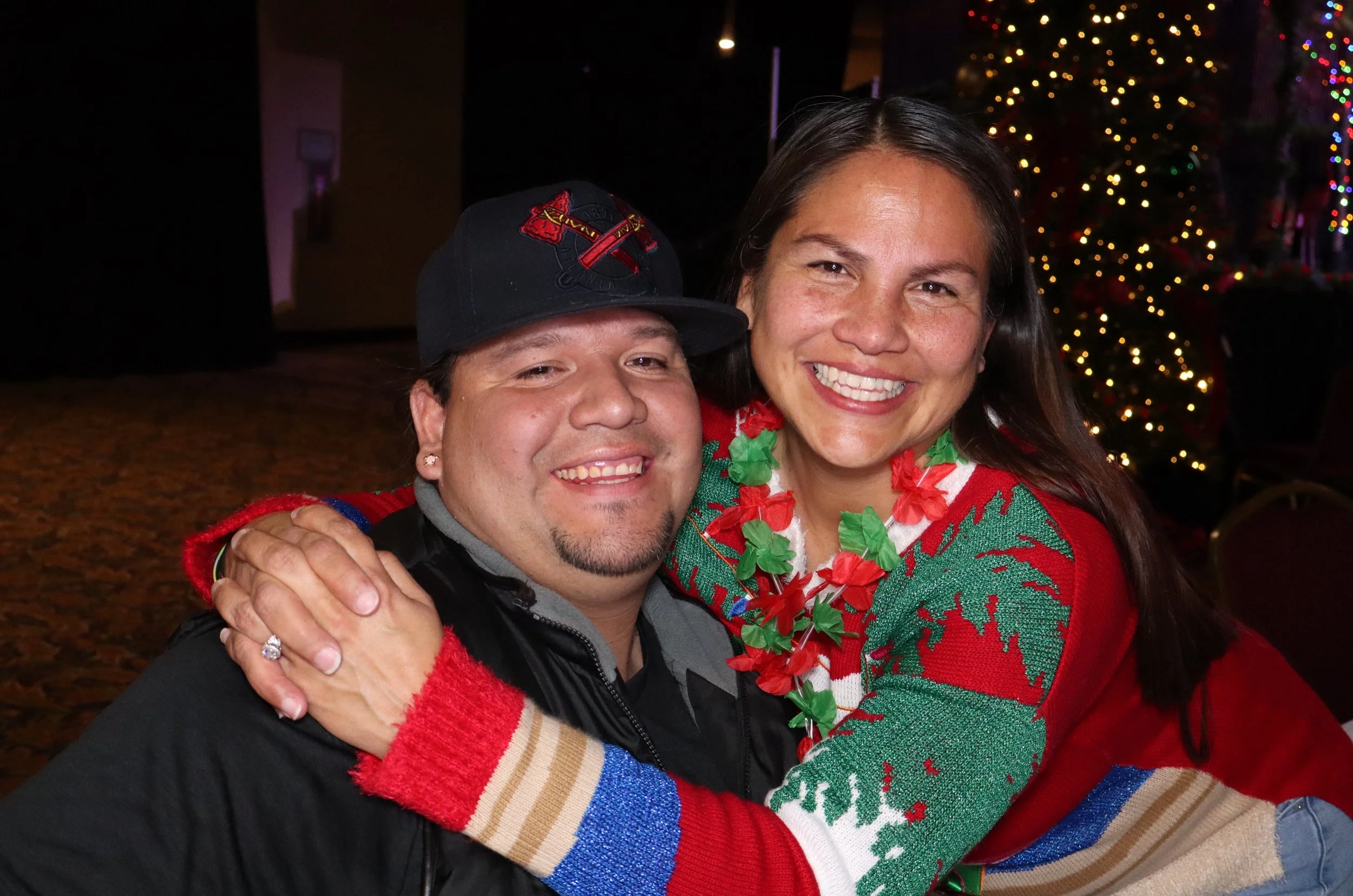 Couple smiles for roaming photo booth in OKC