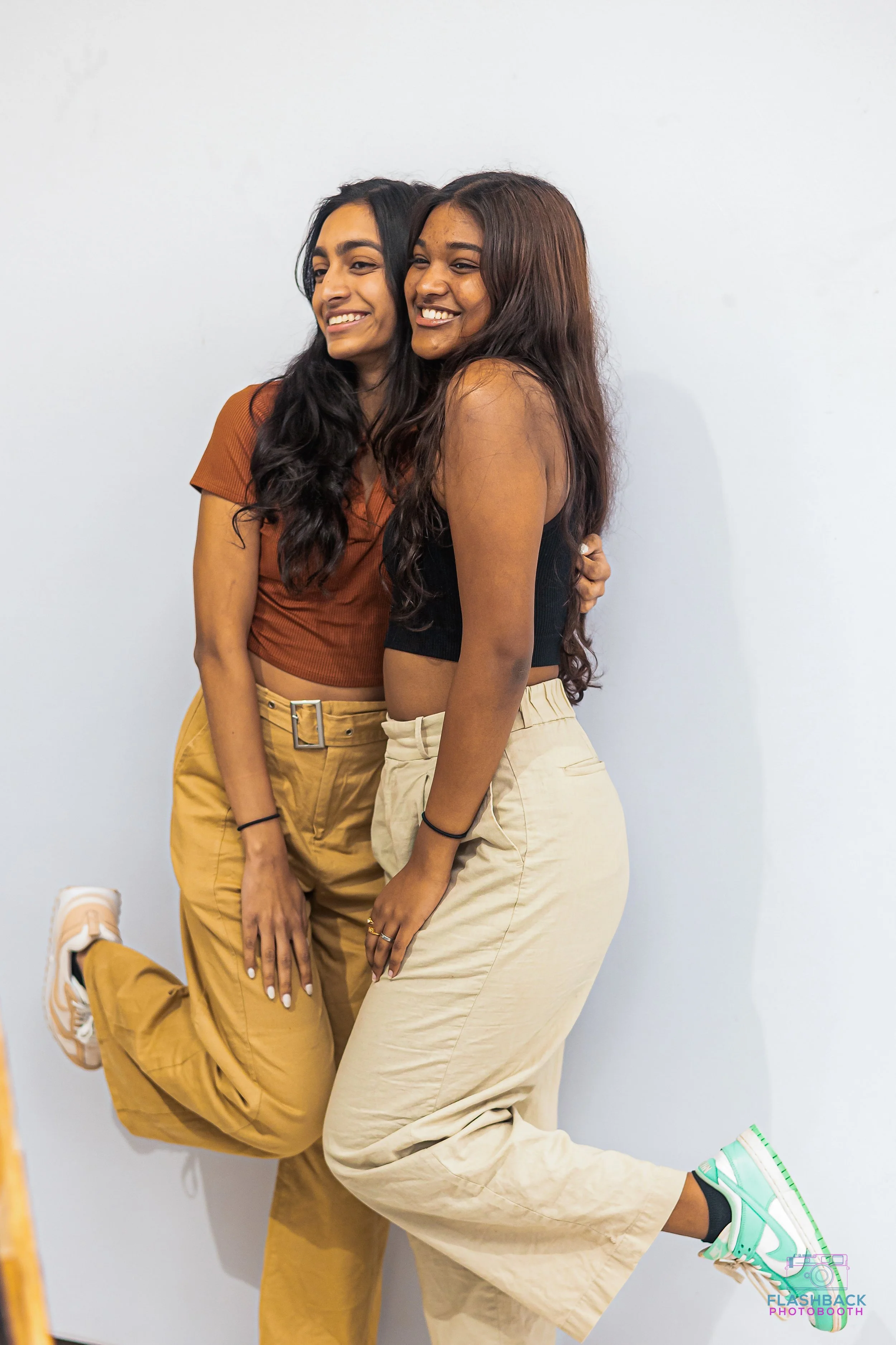 Two women posing for photo booth in oklahoma city