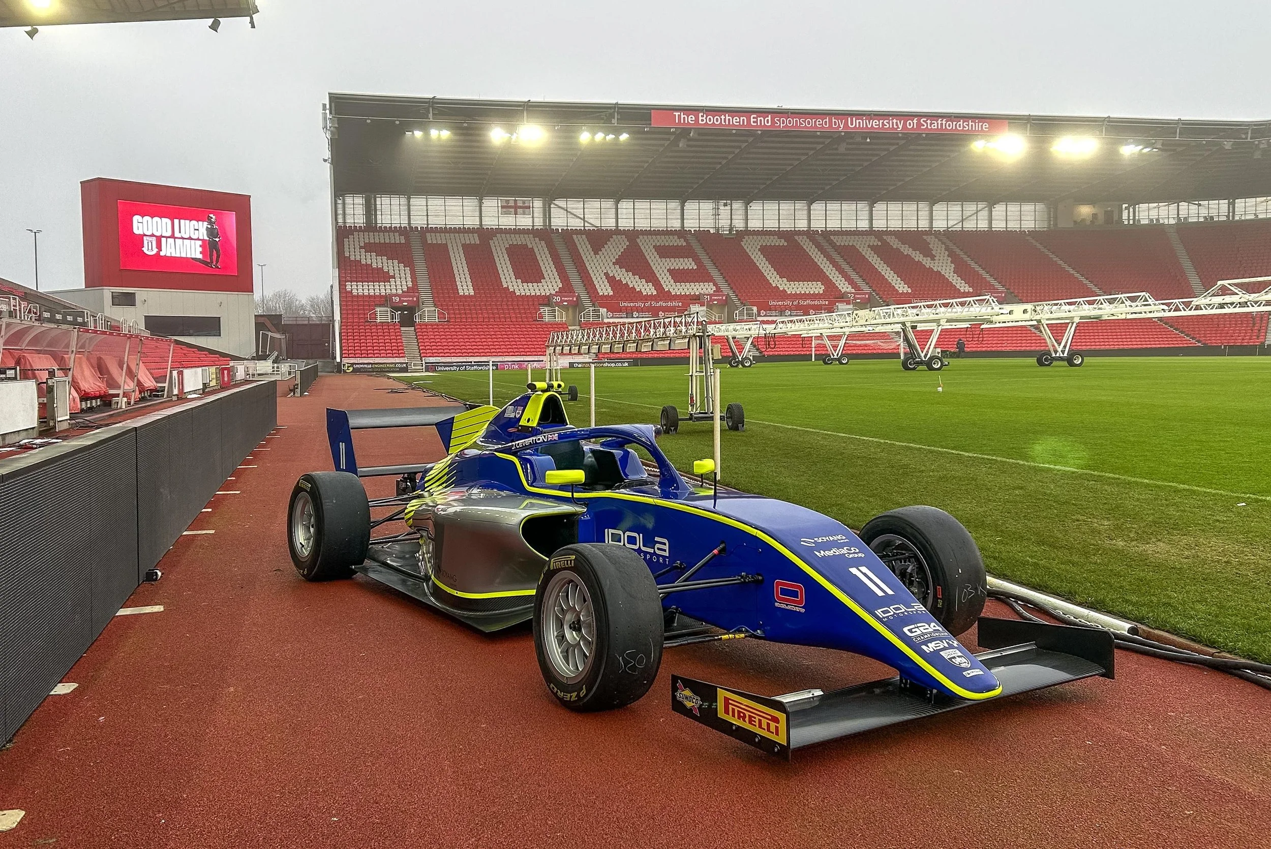 Idola car in blue, neon yellow and silver at the Stoke City Football Ground