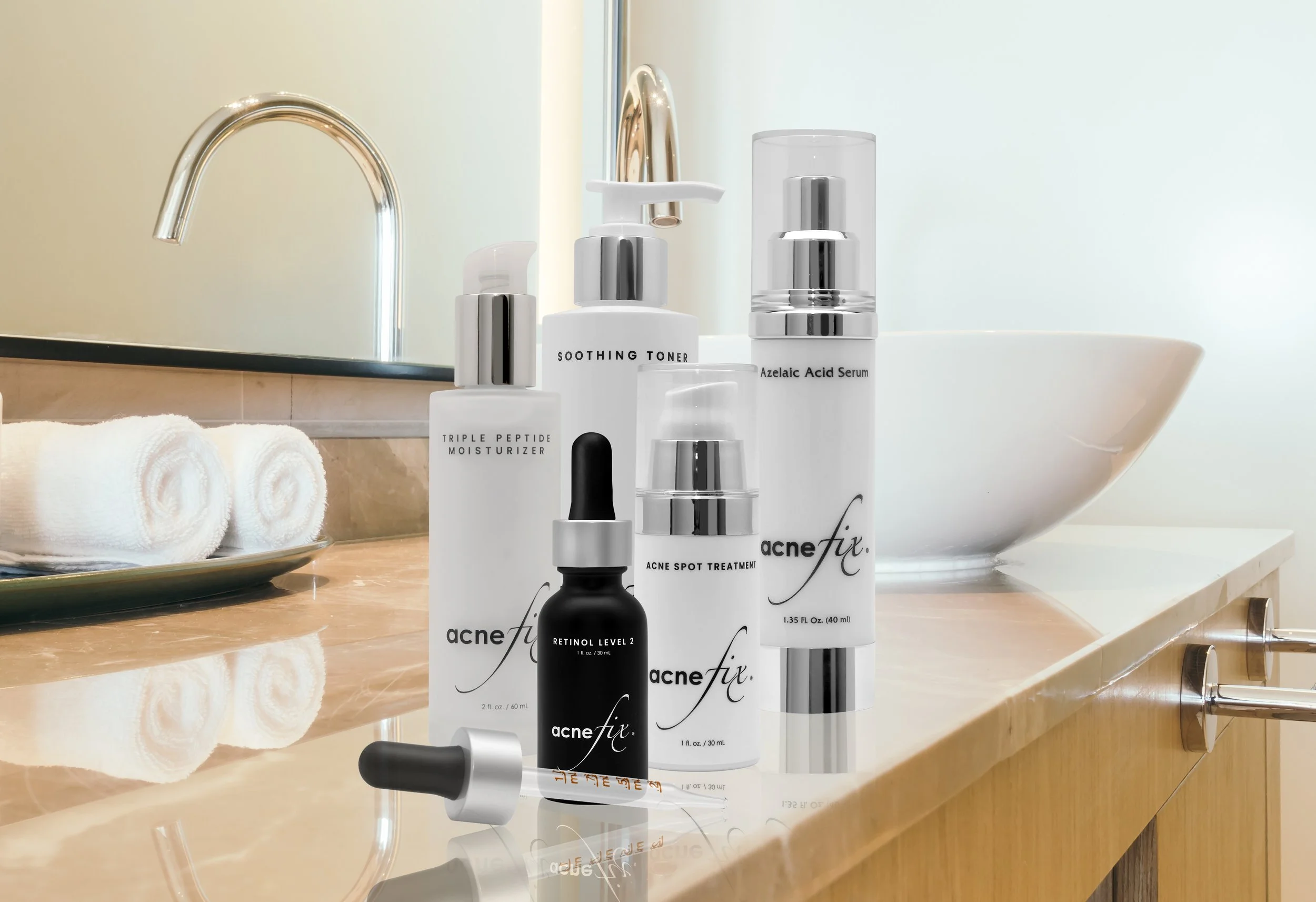 Skincare products on a bathroom counter — professional product photography of serums, moisturizer, toner, and acne treatments