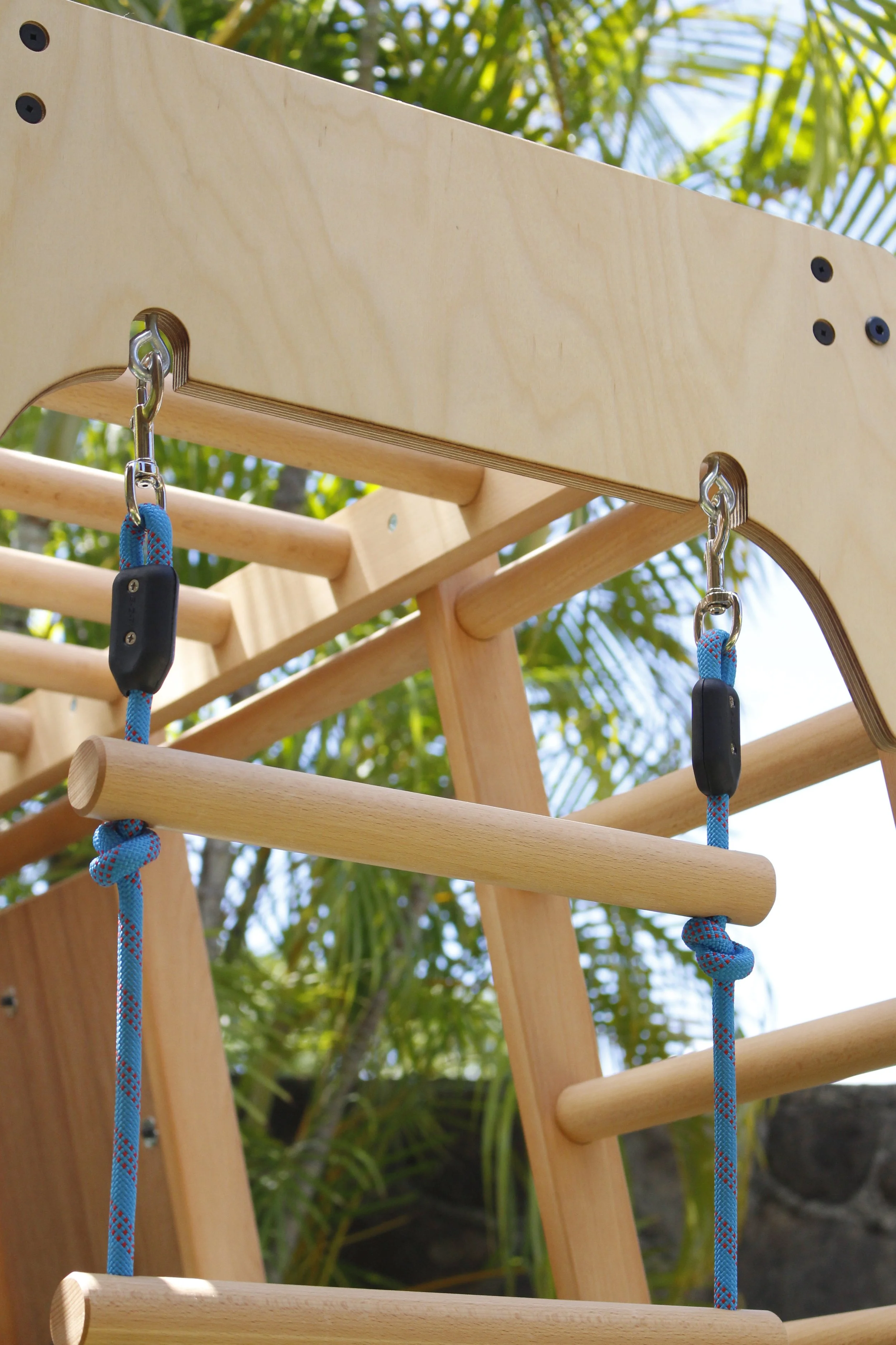 Durable rope end connectors provide a clean knot-free appearance. Shown here is a rope ladder attachment.