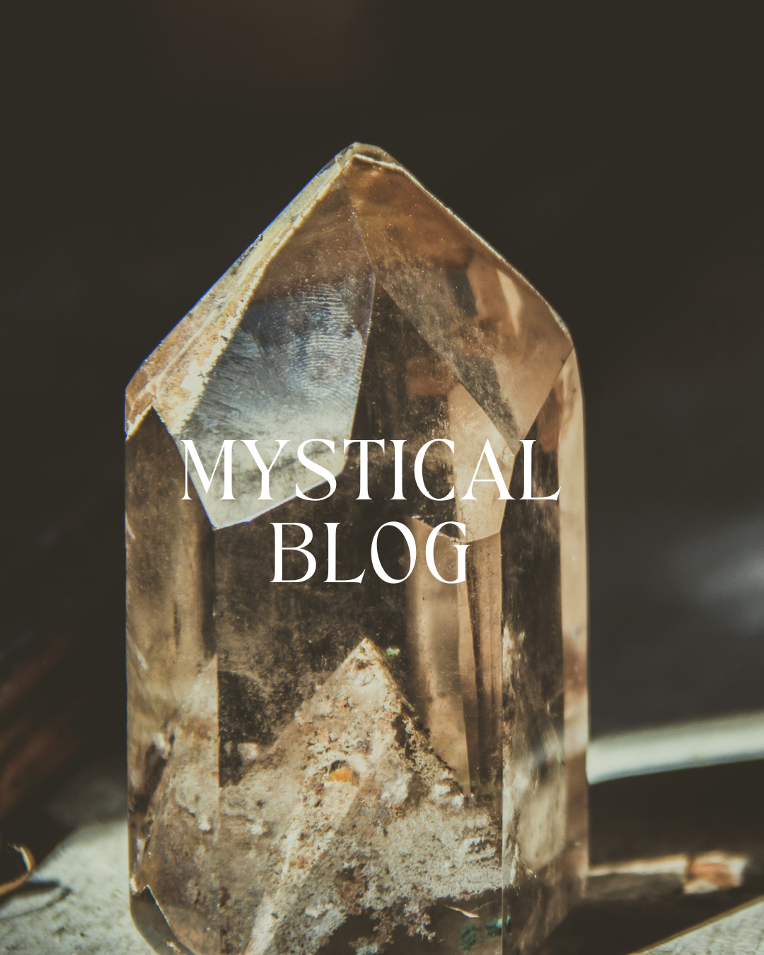 Close-up of a large, clear quartz crystal with natural inclusions, with the text 'Mystical Blog' overlaid.