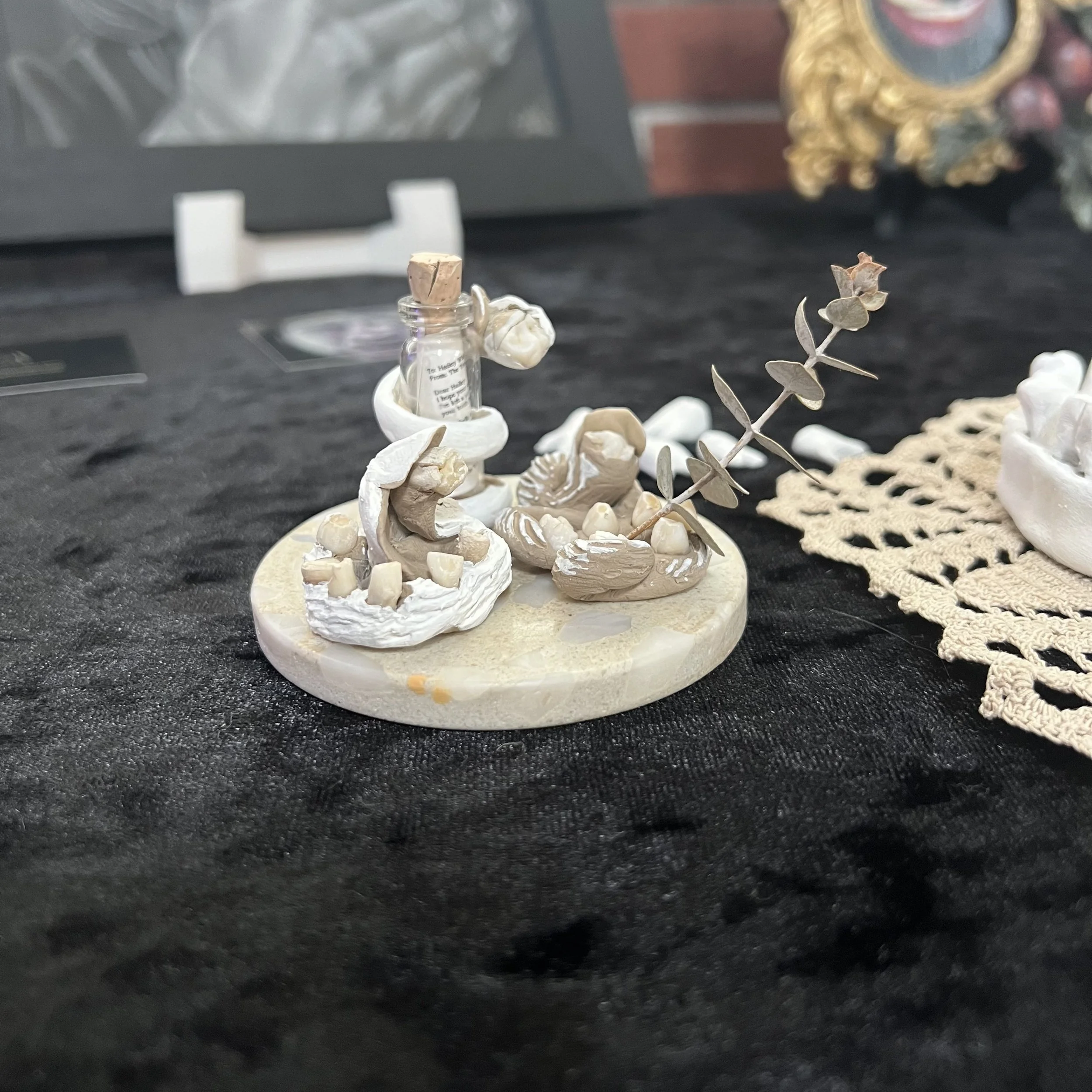 EXUVIA (2025), Clay, Acrylic, Found Objects & Baby Teeth (mine)