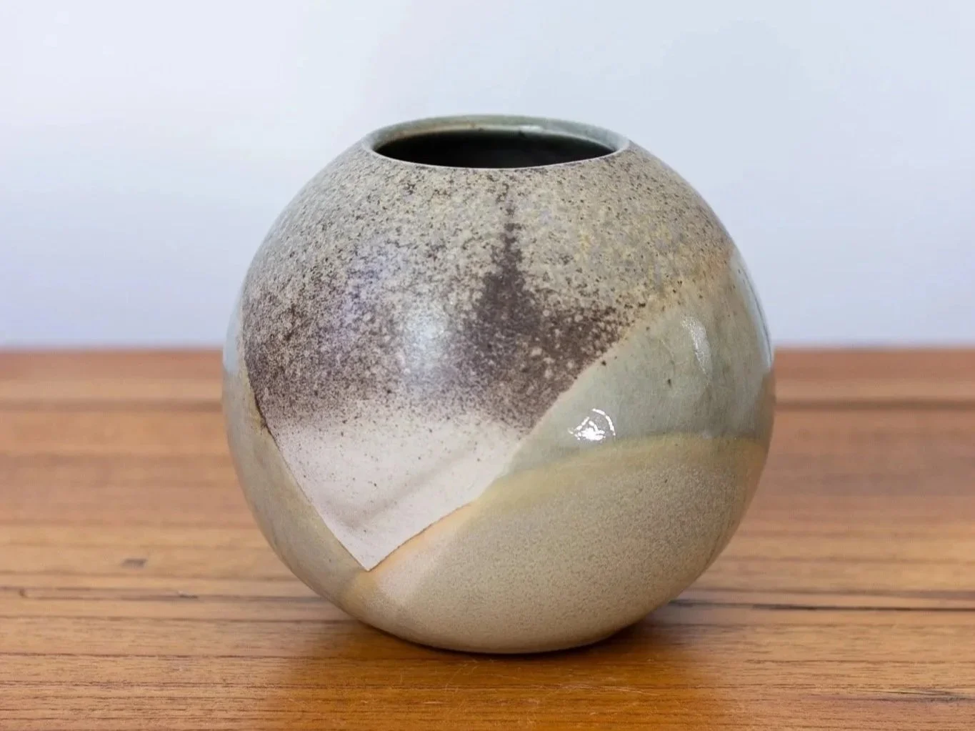 Wood fired ceramic moon jar vase with celadon glaze