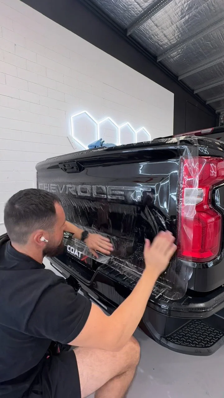 Strangely satisfying laying down some #xpel PPF into the embossed letters on the back of the #silverado