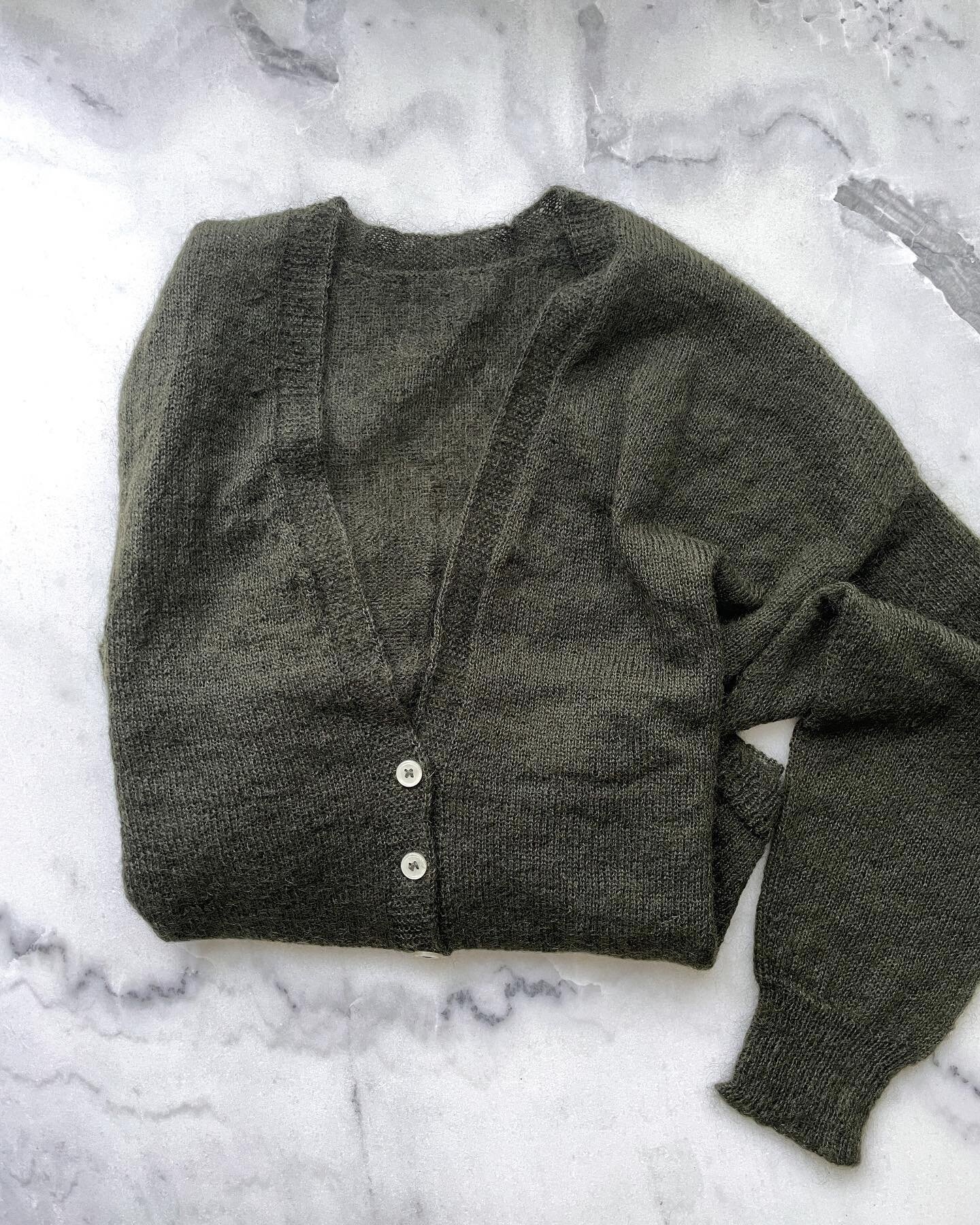 Ladies! Your favourite, The Mist cardigan, in the colours for the season are back in stock!

Deep olive is a beautiful deep green with a brown undertone.
White peach is a soft, pale baby pink.
Both are mohair blend, ultra light and simply divine. The
