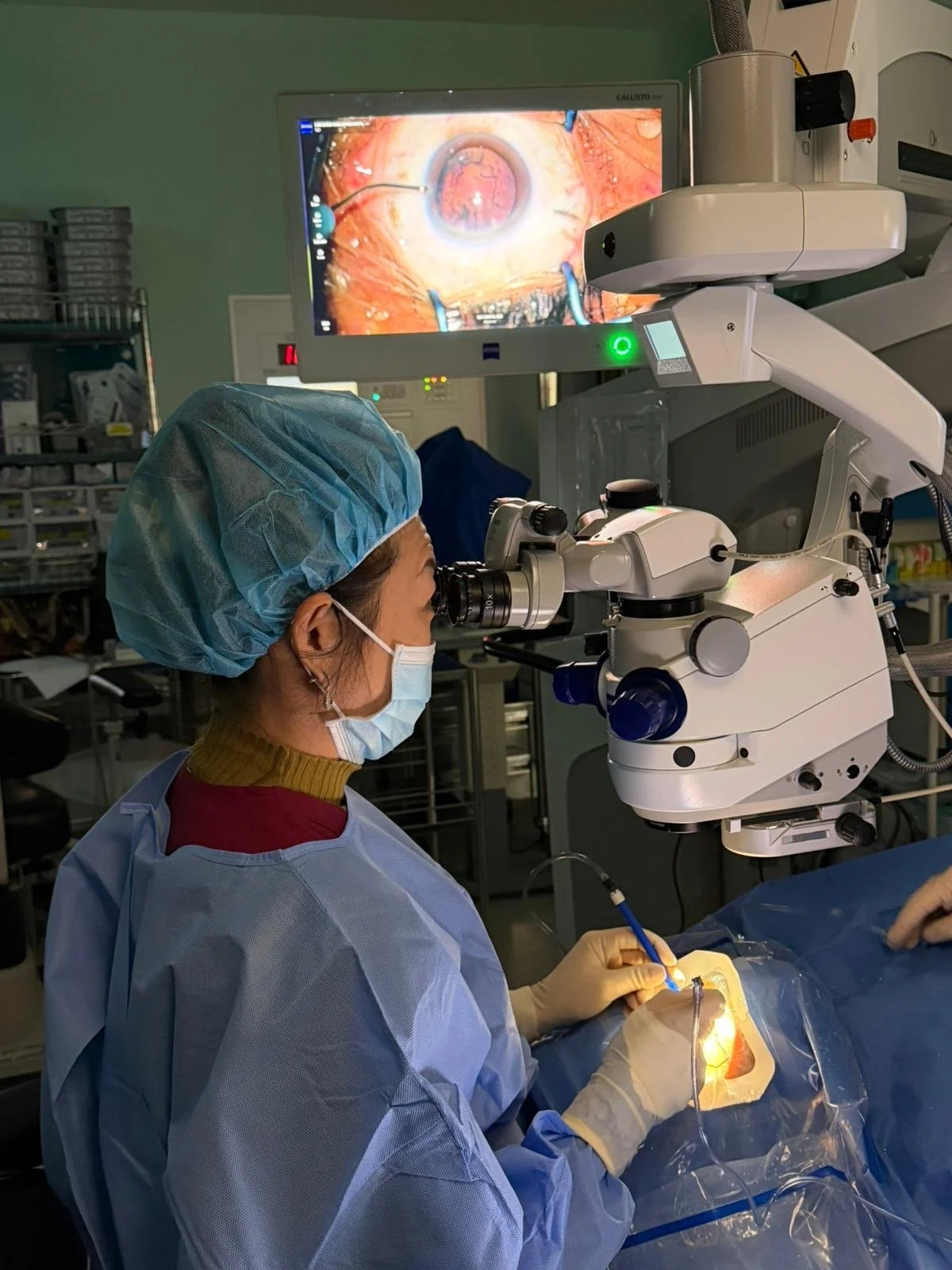 doctor operating with microscope on the eye