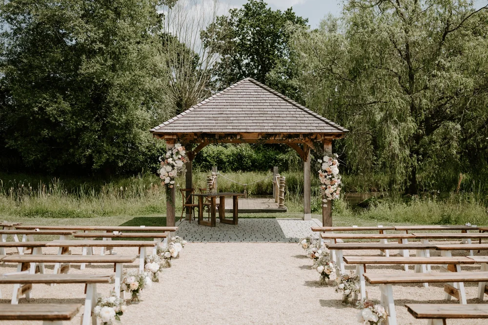The lakeside ceremony setting at Silchester Farm