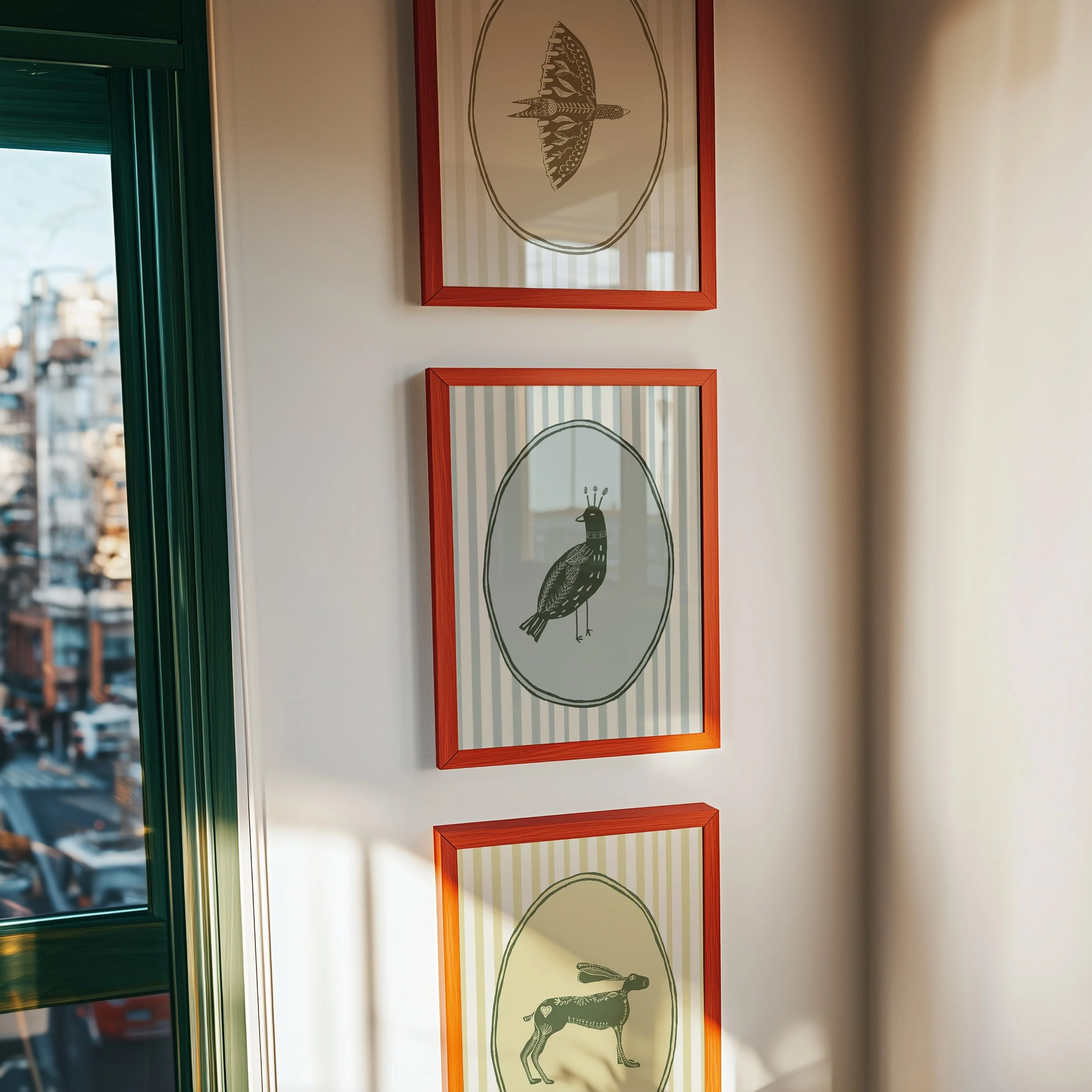 Three framed folk art prints