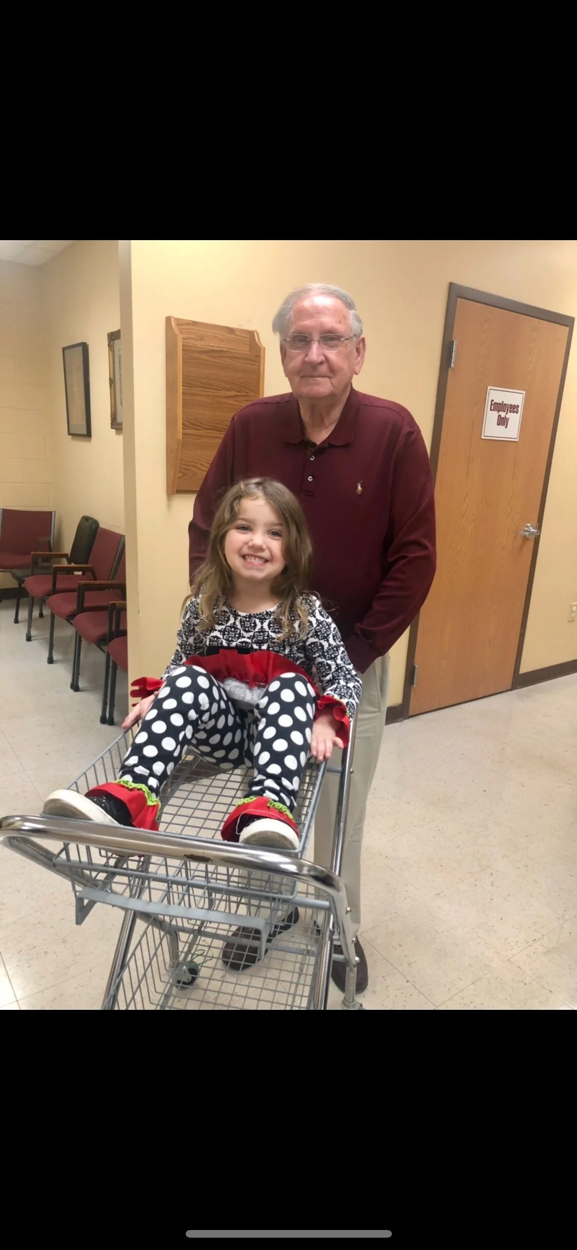 Office Manager Perry Sewell with Great Granddaughter Tylie Sewell 