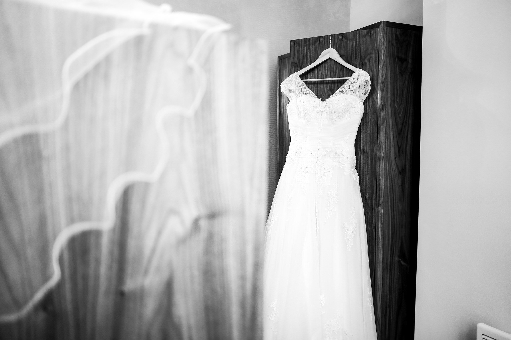 Wedding dress hanging - Authentic Wedding photography.jpg