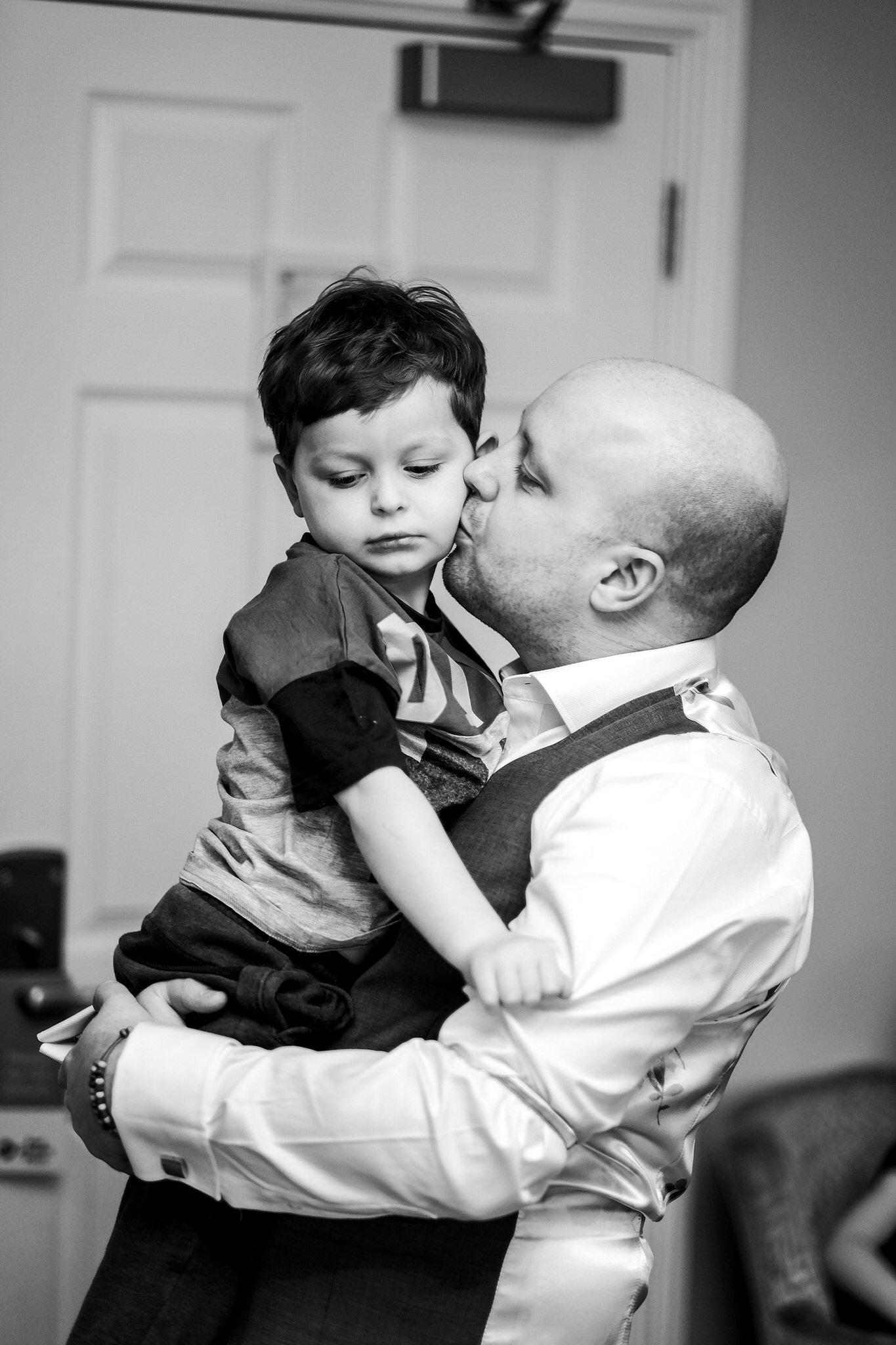 groom with son - Authentic Wedding photography.jpg