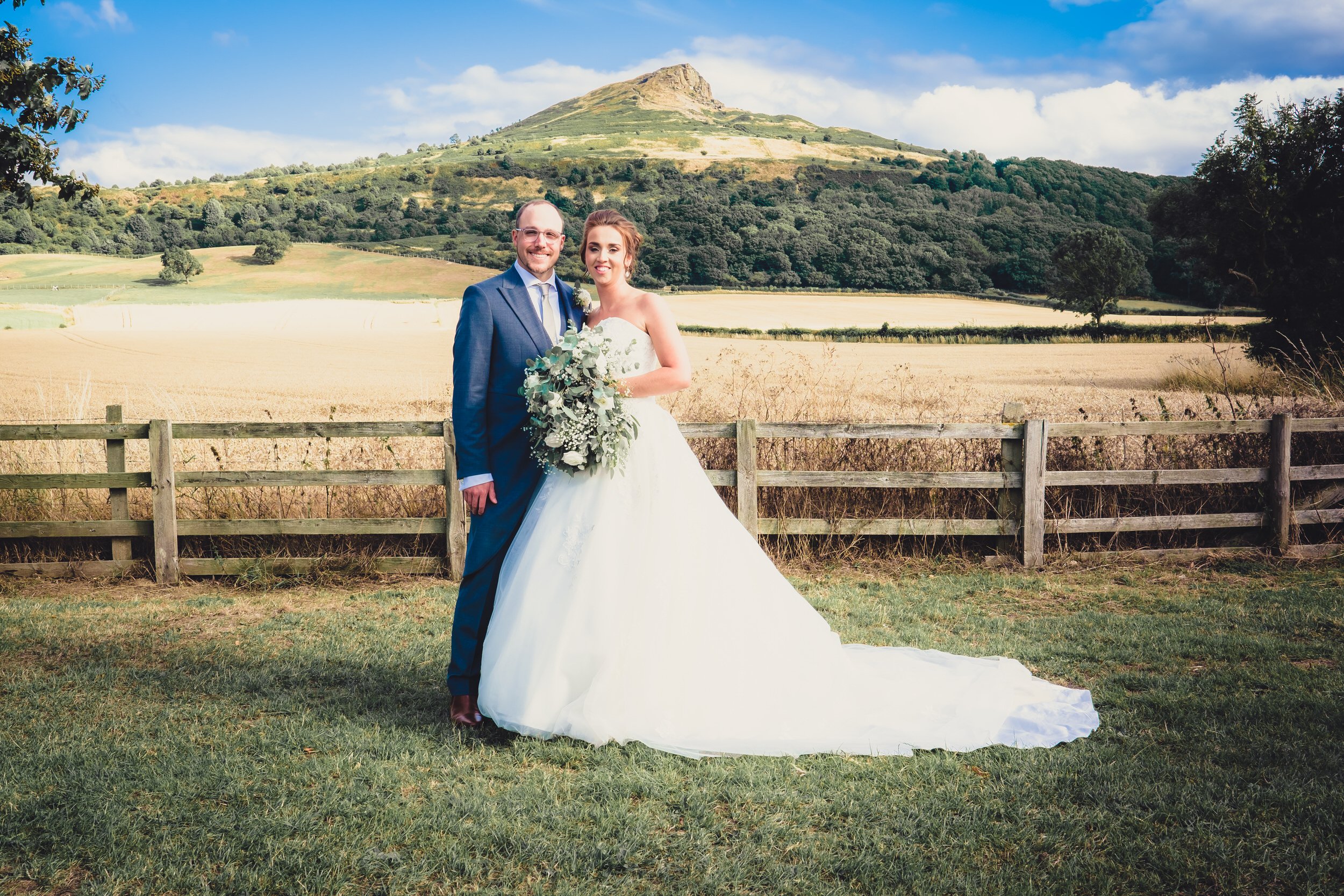 Bride and groom standing in front of roseberry topping | taylor wedding | wedding photography glasgow.jpg