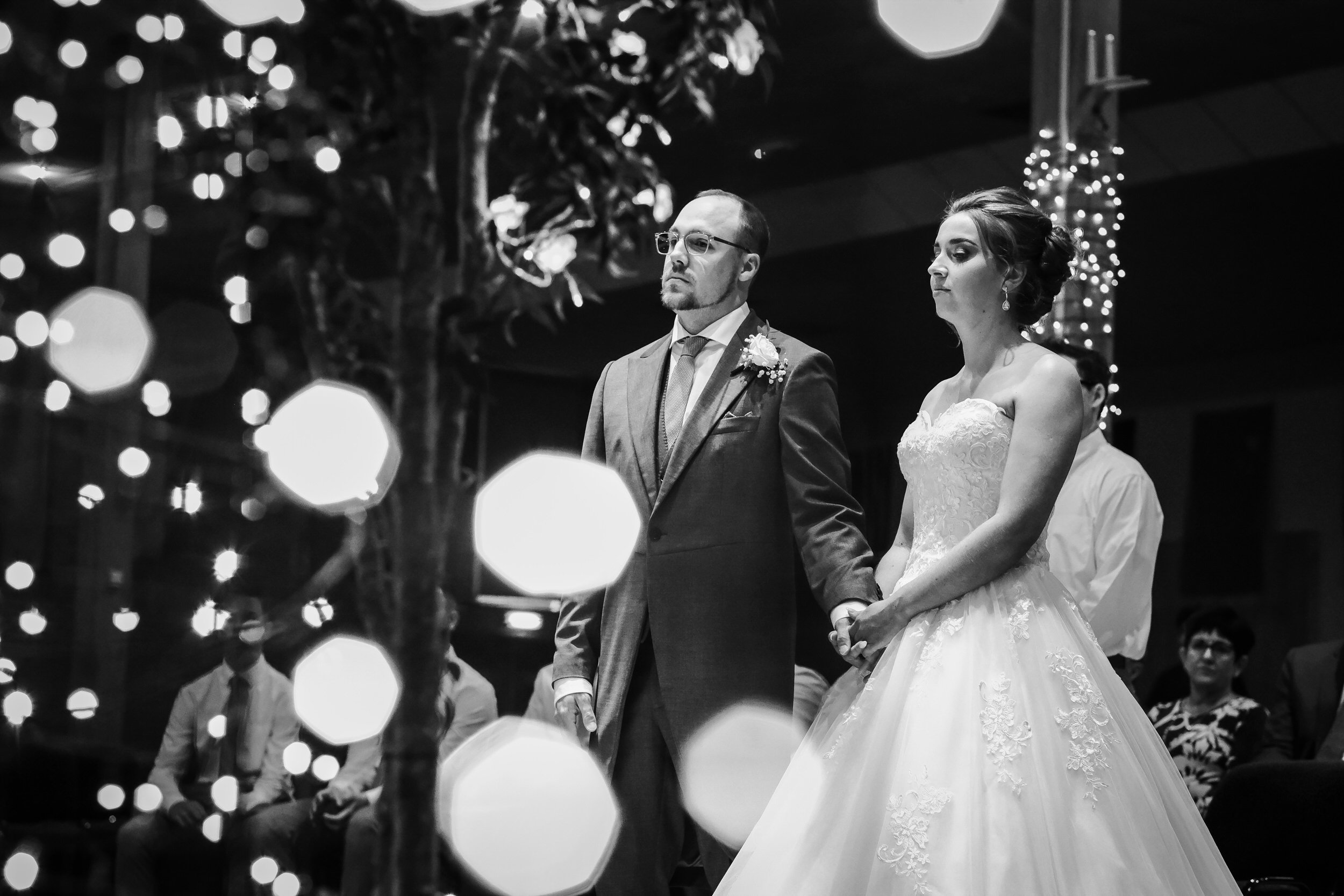 Bride and groom praying with bokeh lights | taylor wedding | wedding photography glasgow.JPG