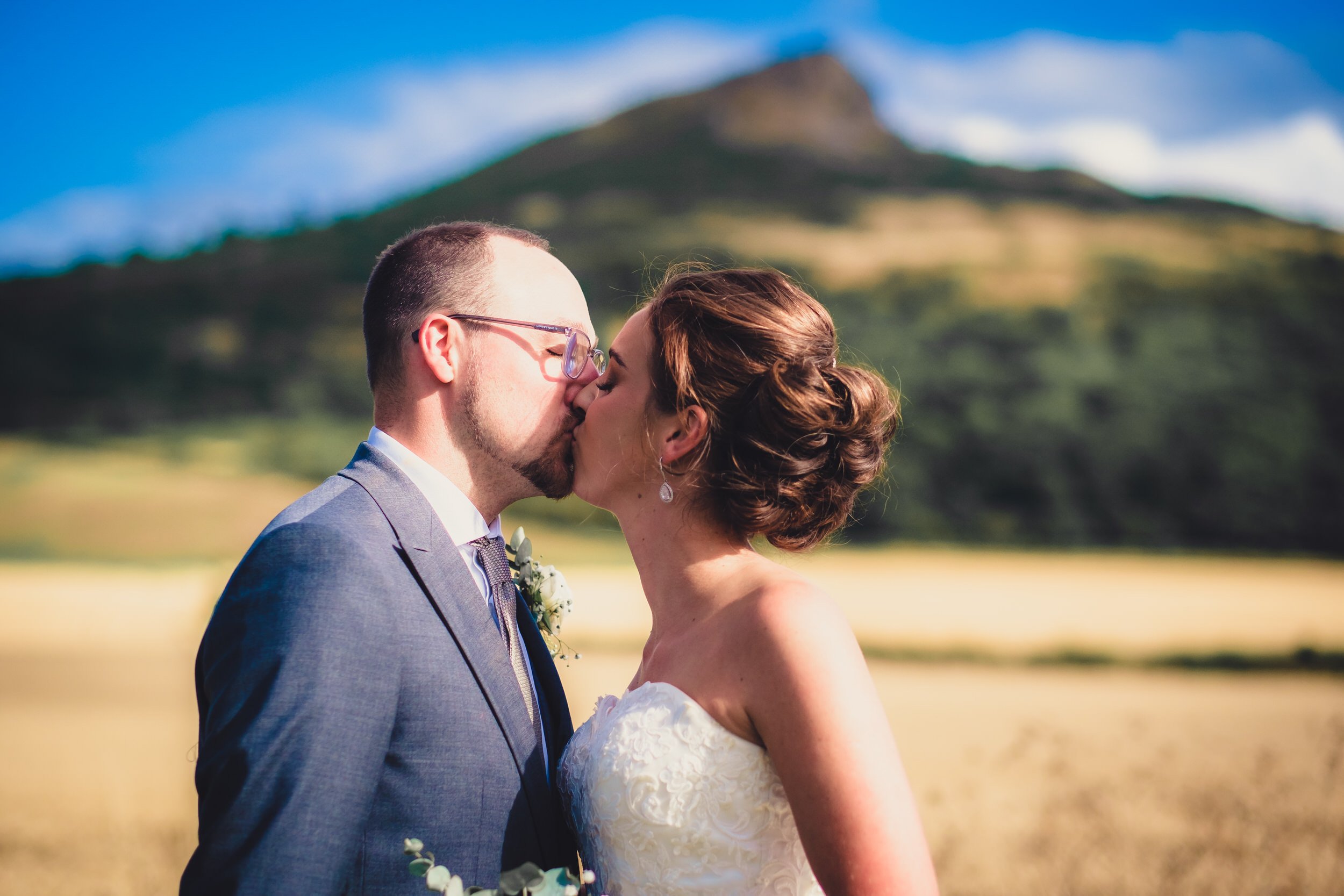 Bride and groom sharing a kiss | taylor wedding | wedding photography glasgow.jpg