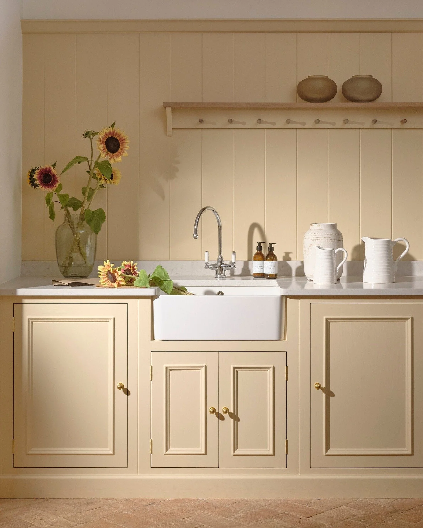 Buttery yellow has been the colour of the year and we can see why. It&rsquo;s soft yet uplifting, adding instant warmth and joy to any space. In this Chichester utility, it transforms a practical room into one that feels light, fresh, and full of sum