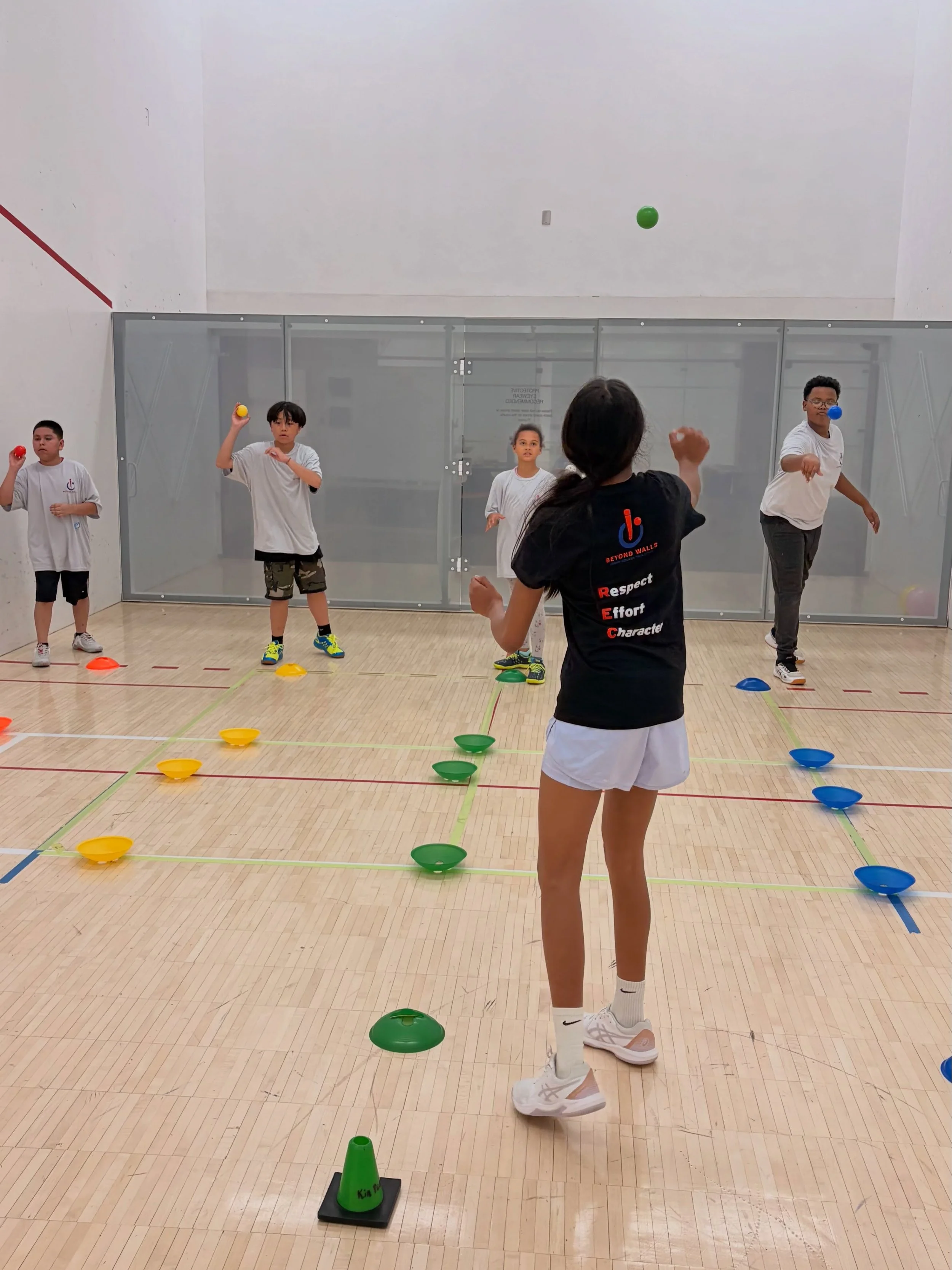 Summer camps have begun at Beyond Walls! Throughout the month of July, we are running camps for rising 5th and 6th graders in the Twin Cities. For these first few days of camp, we are focusing on hand-eye coordination, the squash grip, and the leader