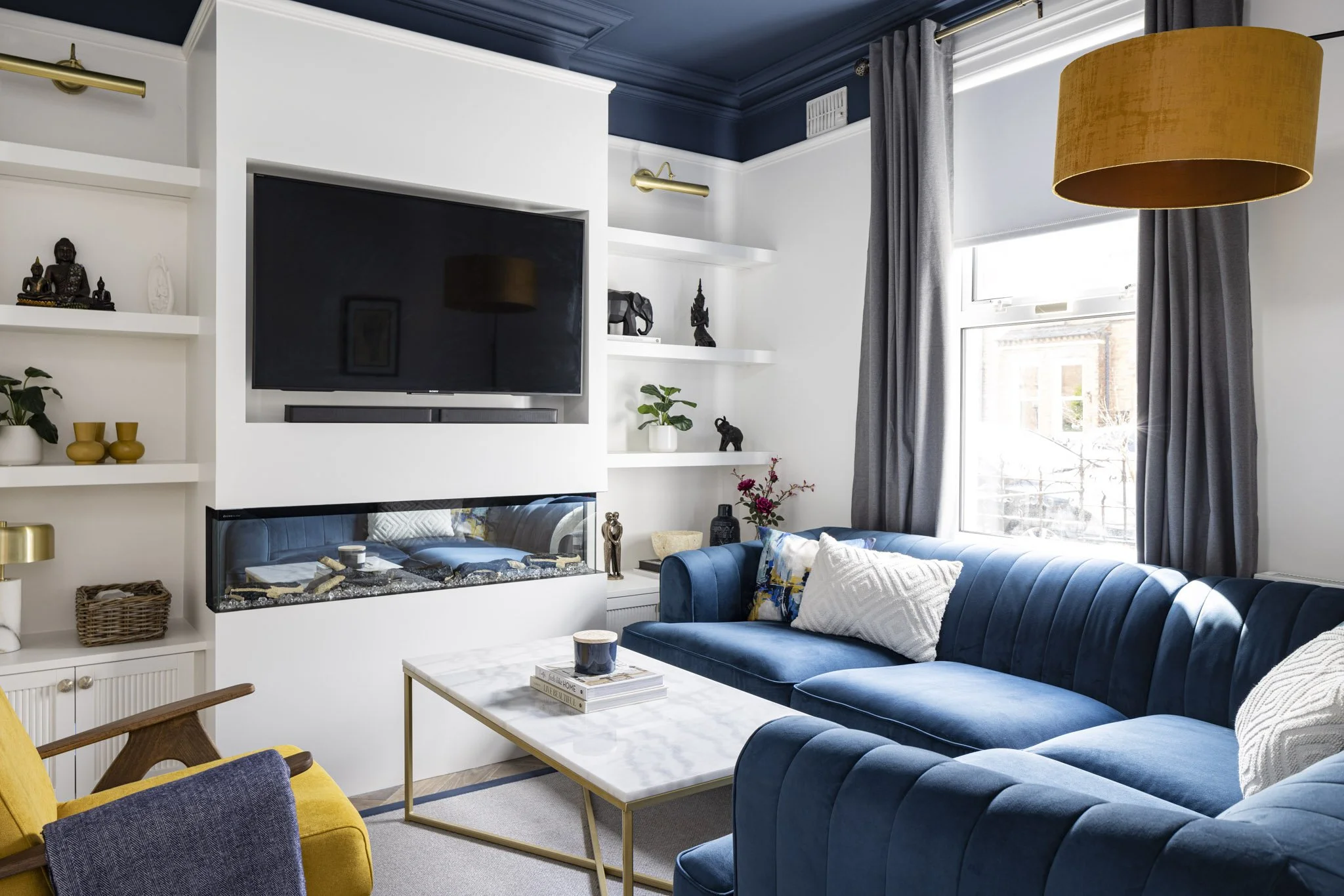 Navy yellow and white contemporary living room small. Colourtrend Arctic Blonde walls.