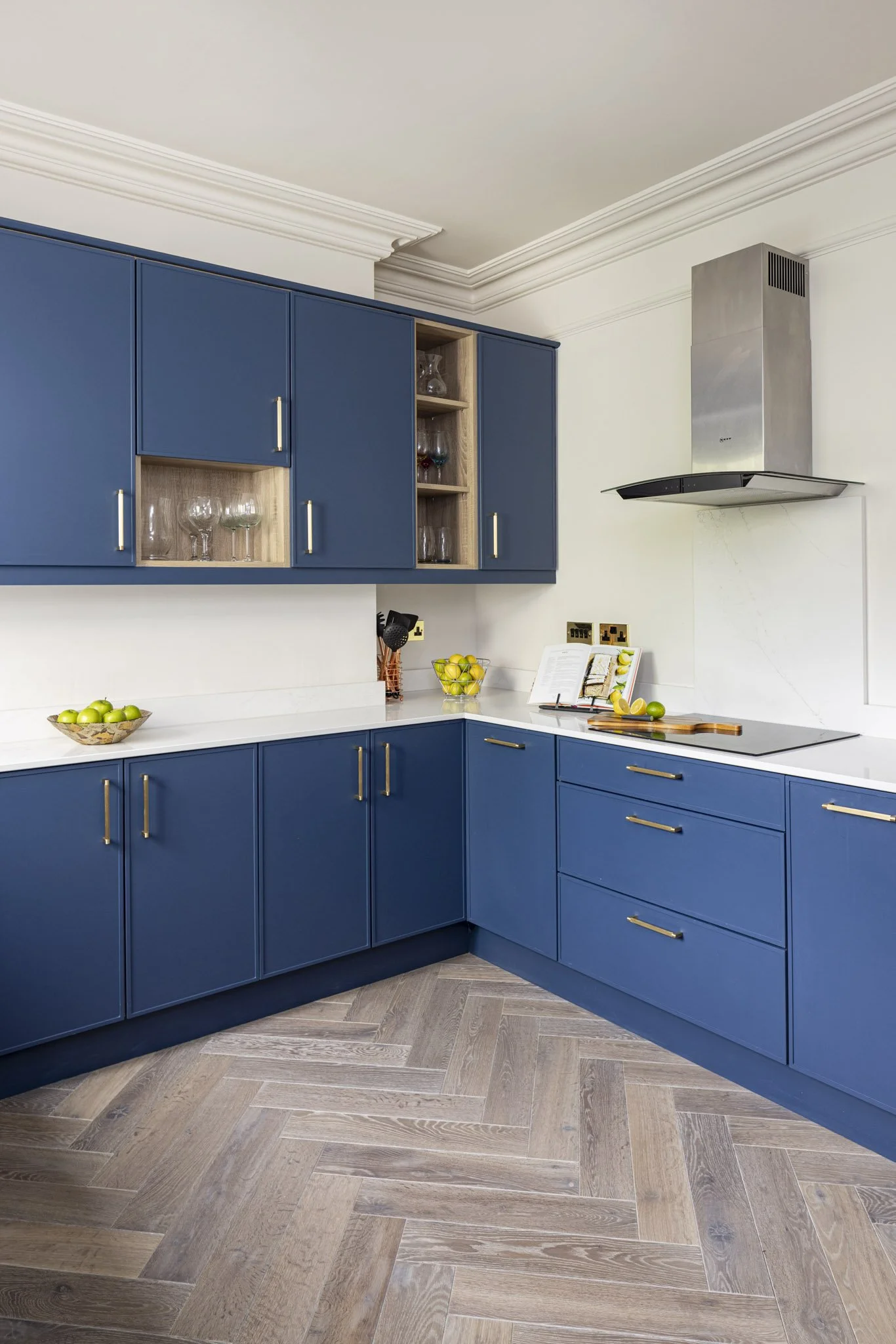 Herringbone floor, navy blue kitchen