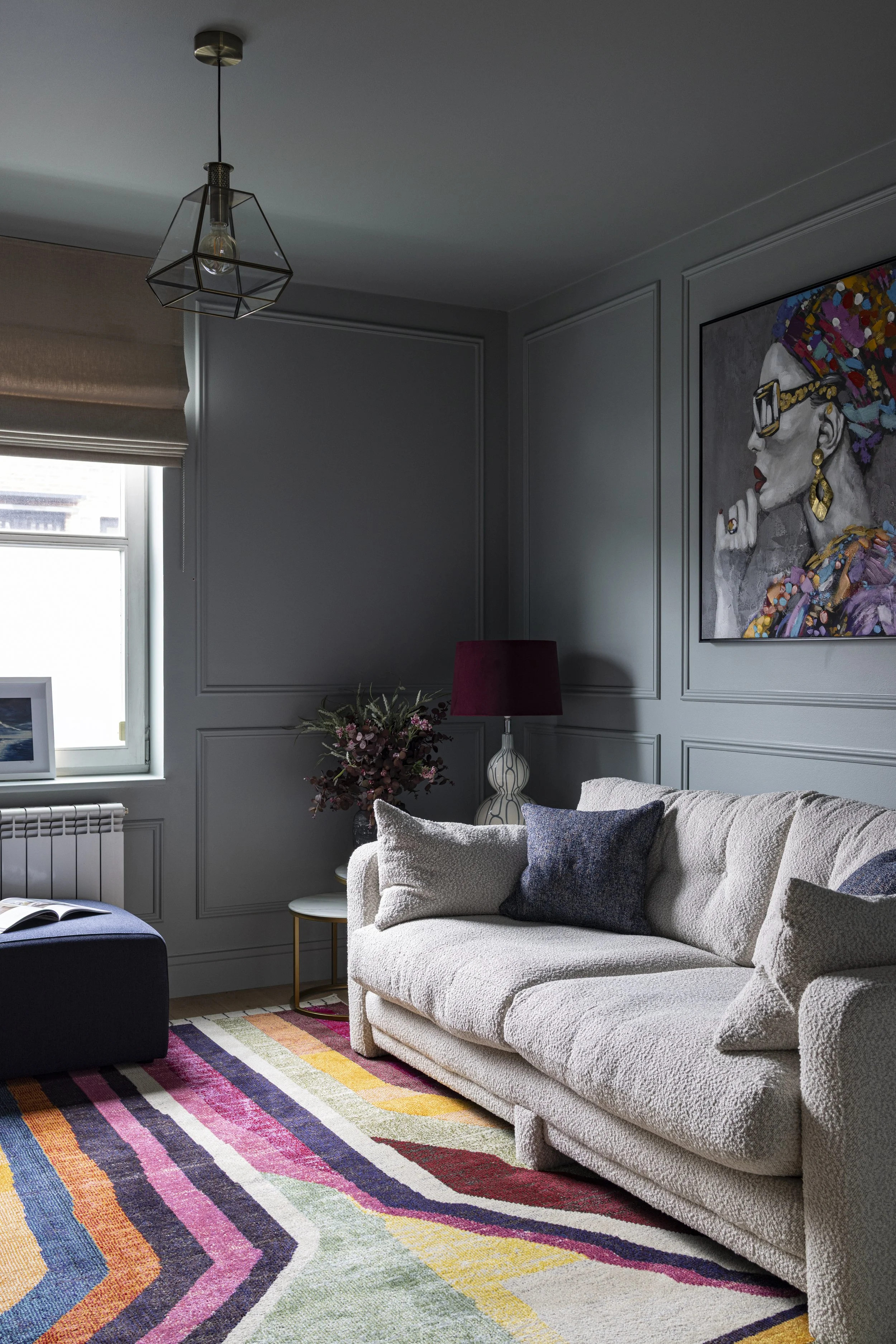 Grey blue living room with classic wall moudling
