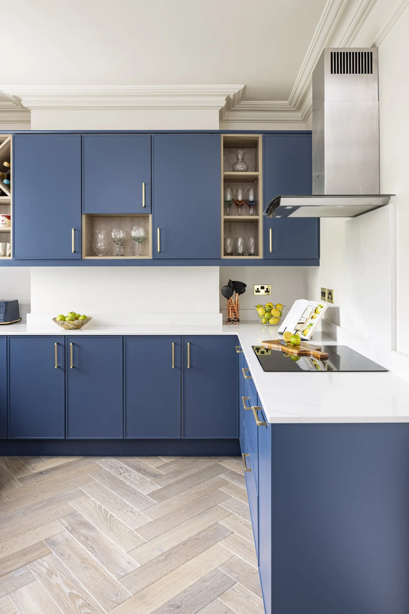Herringbone engineered wood floor, navy blue slim shaker kitchen