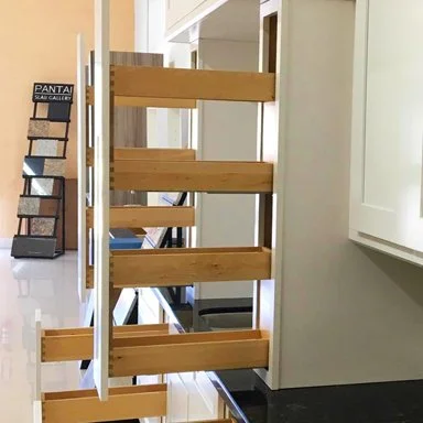 Spice rack in a white shaker kitchen 