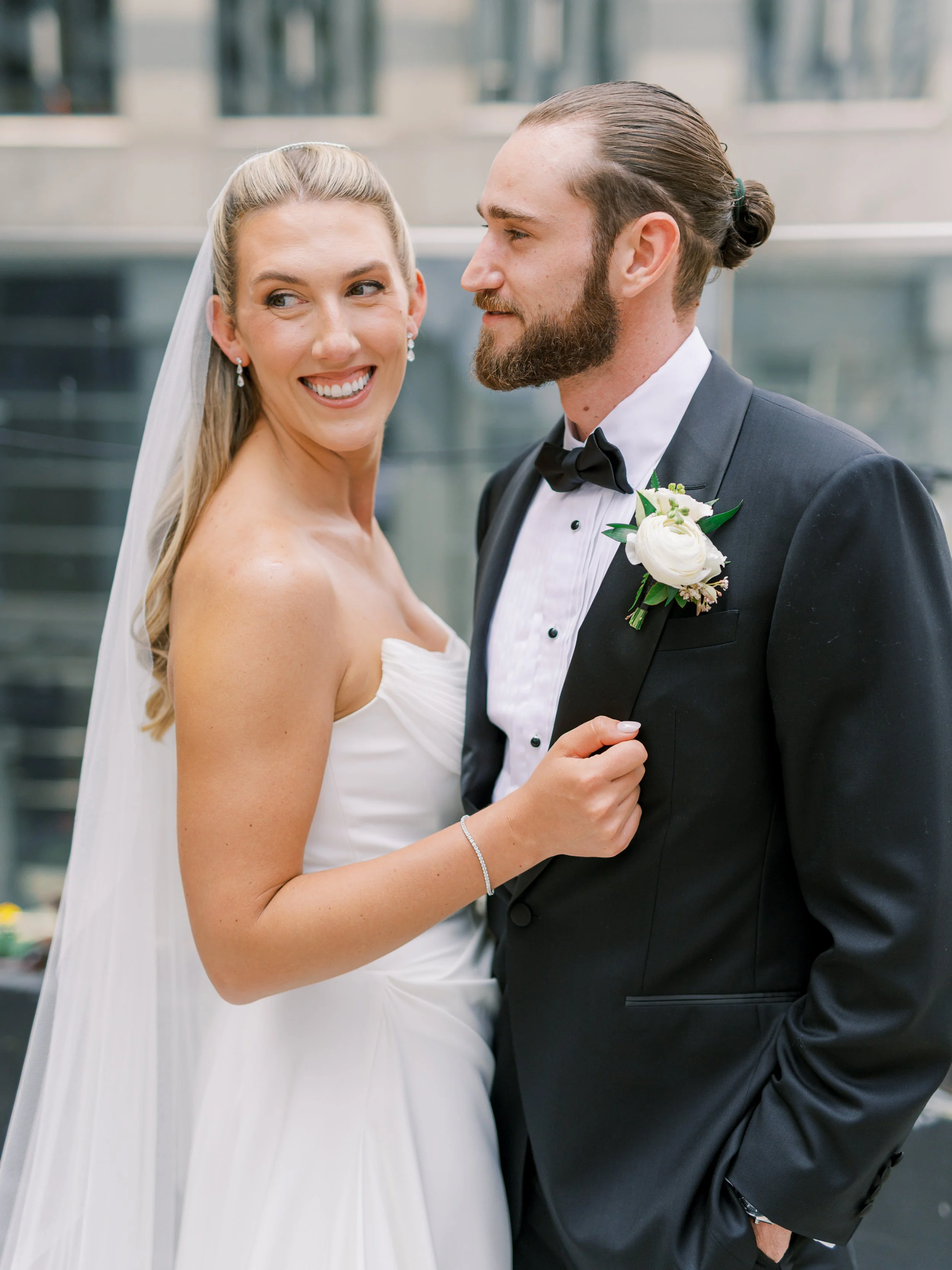 bride and groom posing