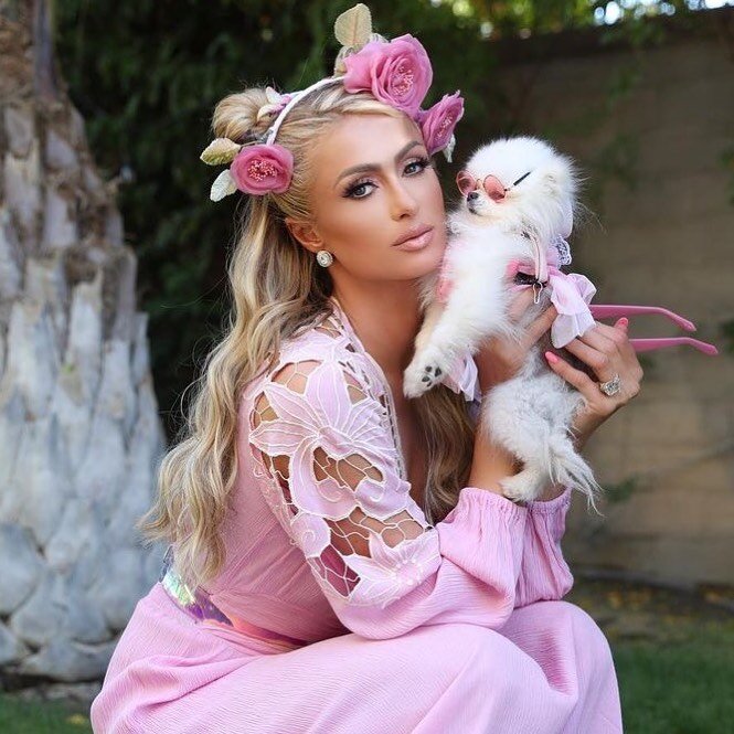 The Queen + Sweet Baby Ether 🤍 Glam by @tressnglow | Posted @withregram &bull; @parishilton My baby slayed his first #Coachella! 💕👸🏼🐩💕 😍 @HiltonPets 💕