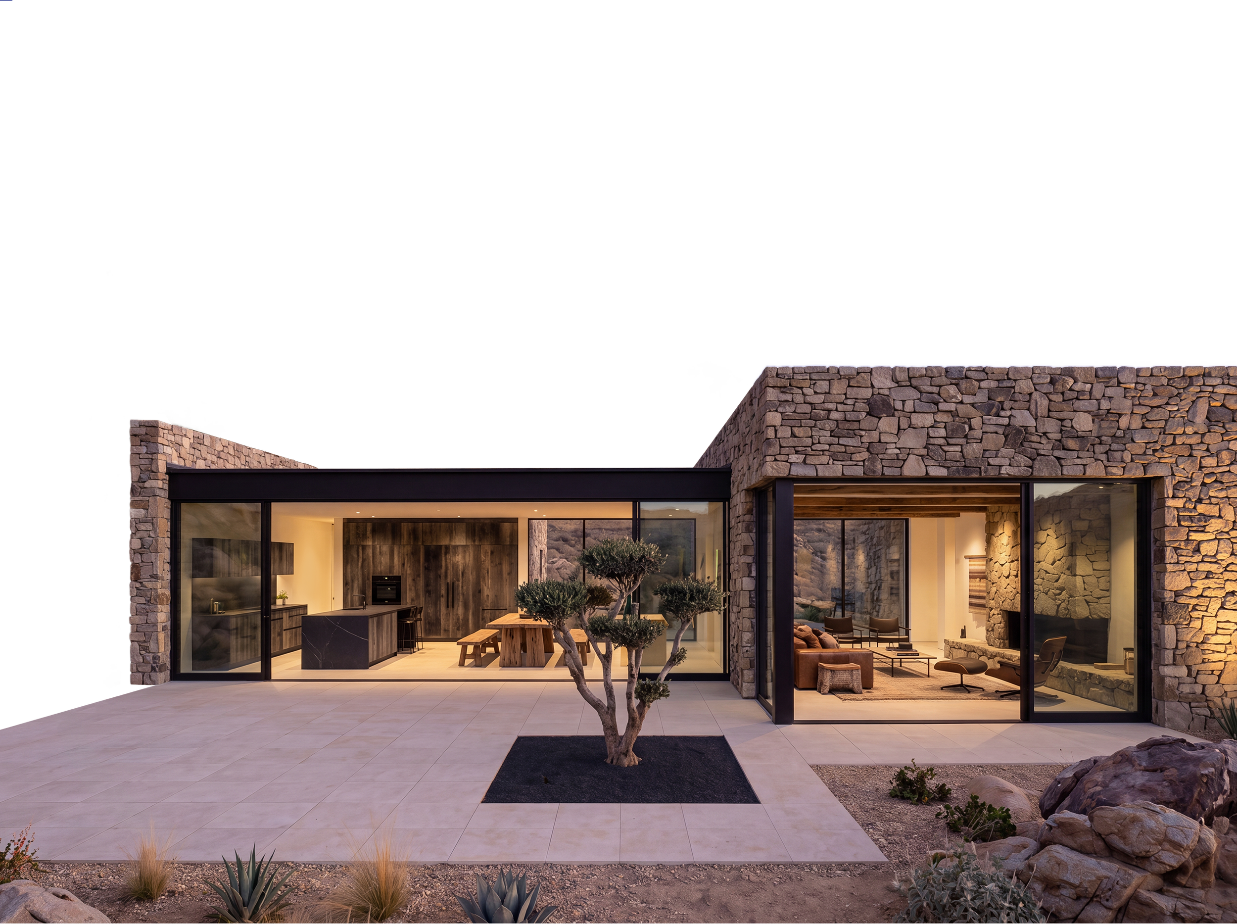 Vivienda de estilo rústico moderno construida por ZONA en Catalunya, con fachada de piedra, grandes ventanales y diseño contemporáneo.