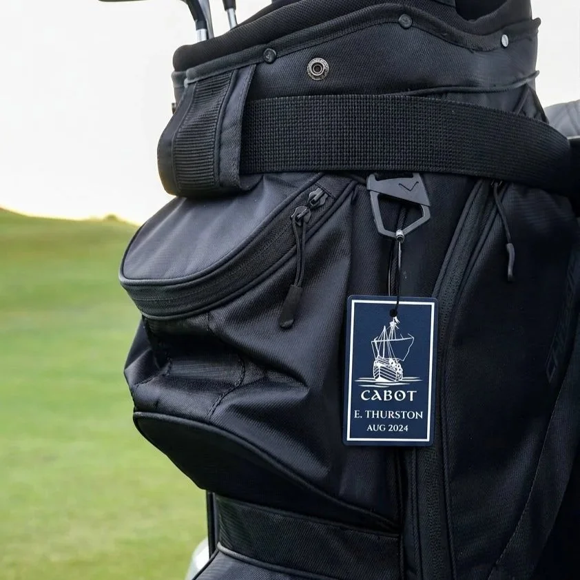 Firefly_Gemini-Flash_Make-the-bag-tag-in-reference-image-1-navy-blue%2C-remove-the-main-Dashclip-logo-and-re-466726.jpg